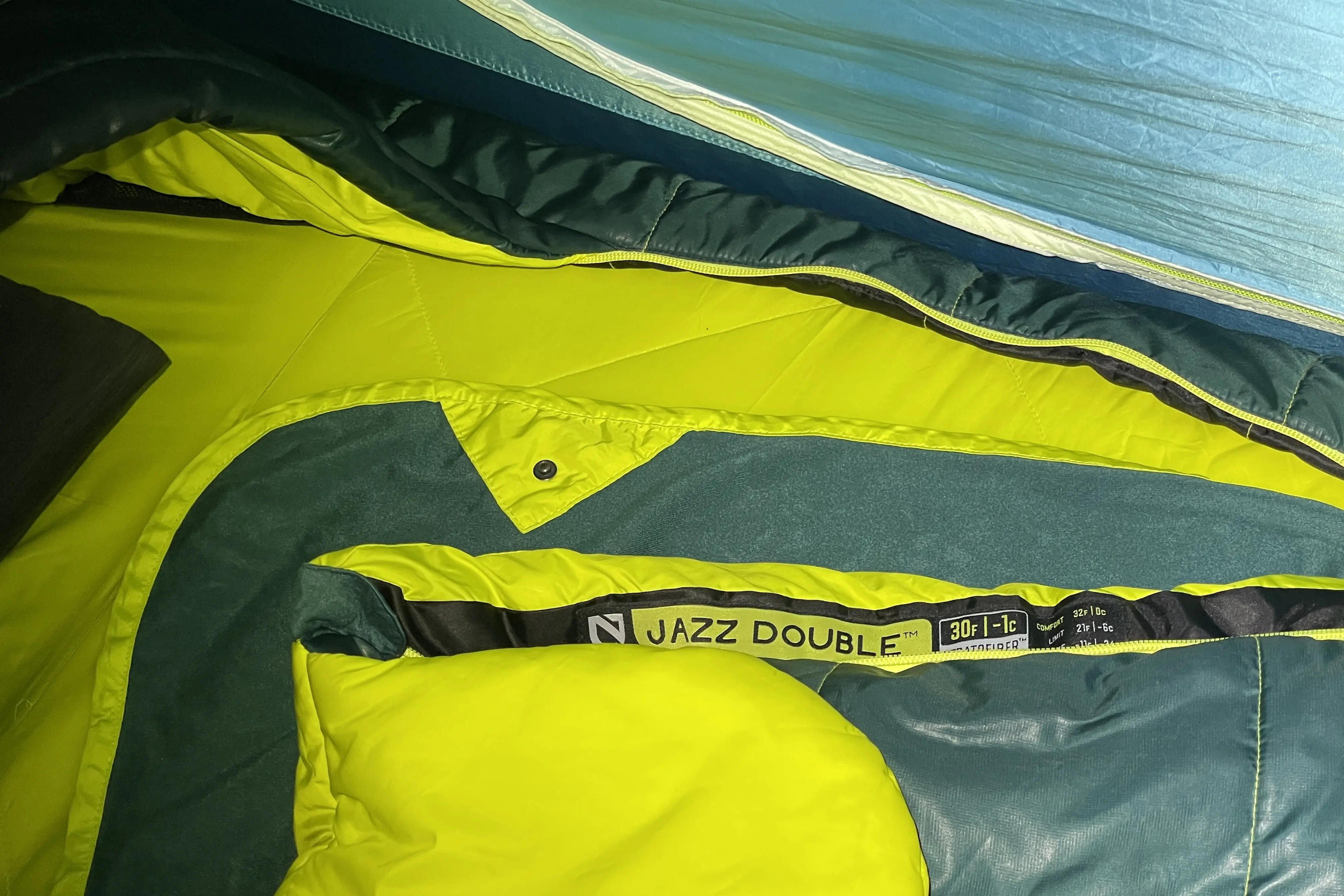 the sleeping bag bottom, the removable bed sheet, the top quilt