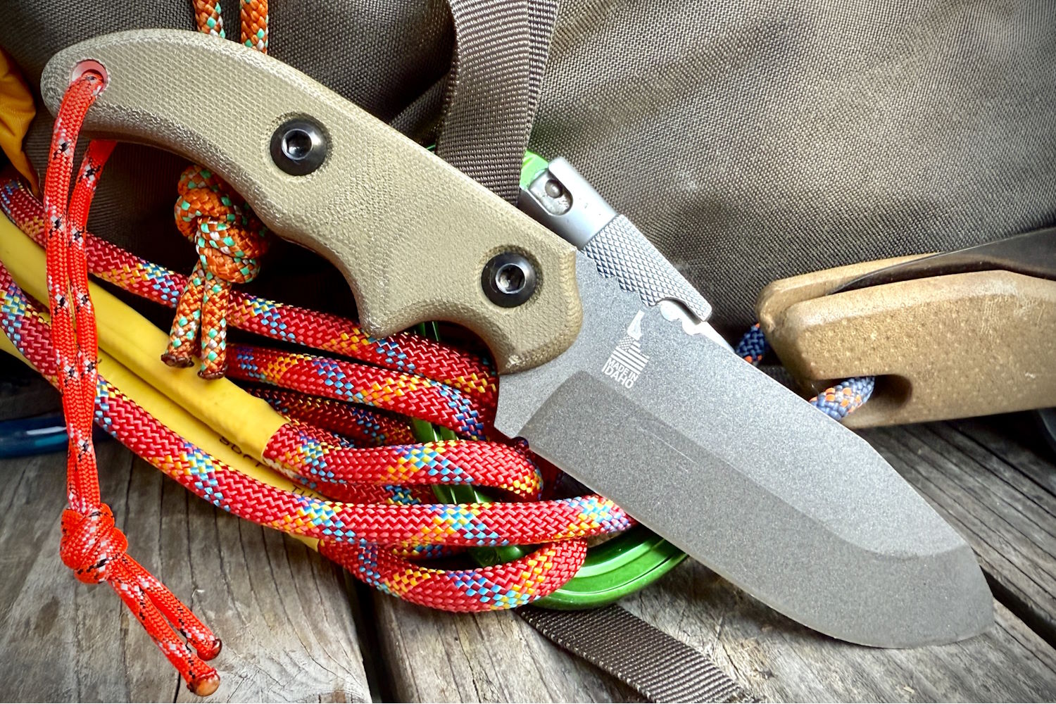 Wilderness Guide ‘23 next to colorful climbing ropes and outdoor gear