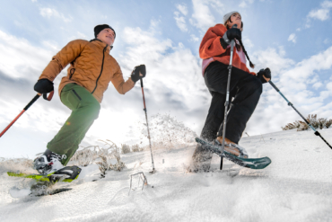 two people snow shoeing