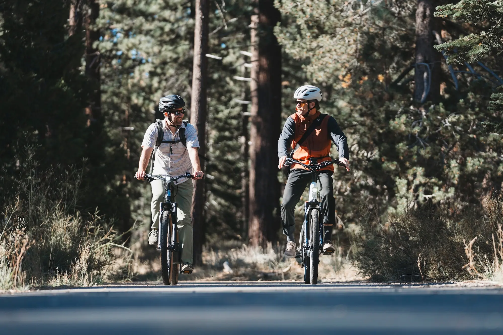 two GearJunkie testers out for a test ride on the Lectric XPress 750 and the Ride1Up Prodigy V2 electric commuter bikes
