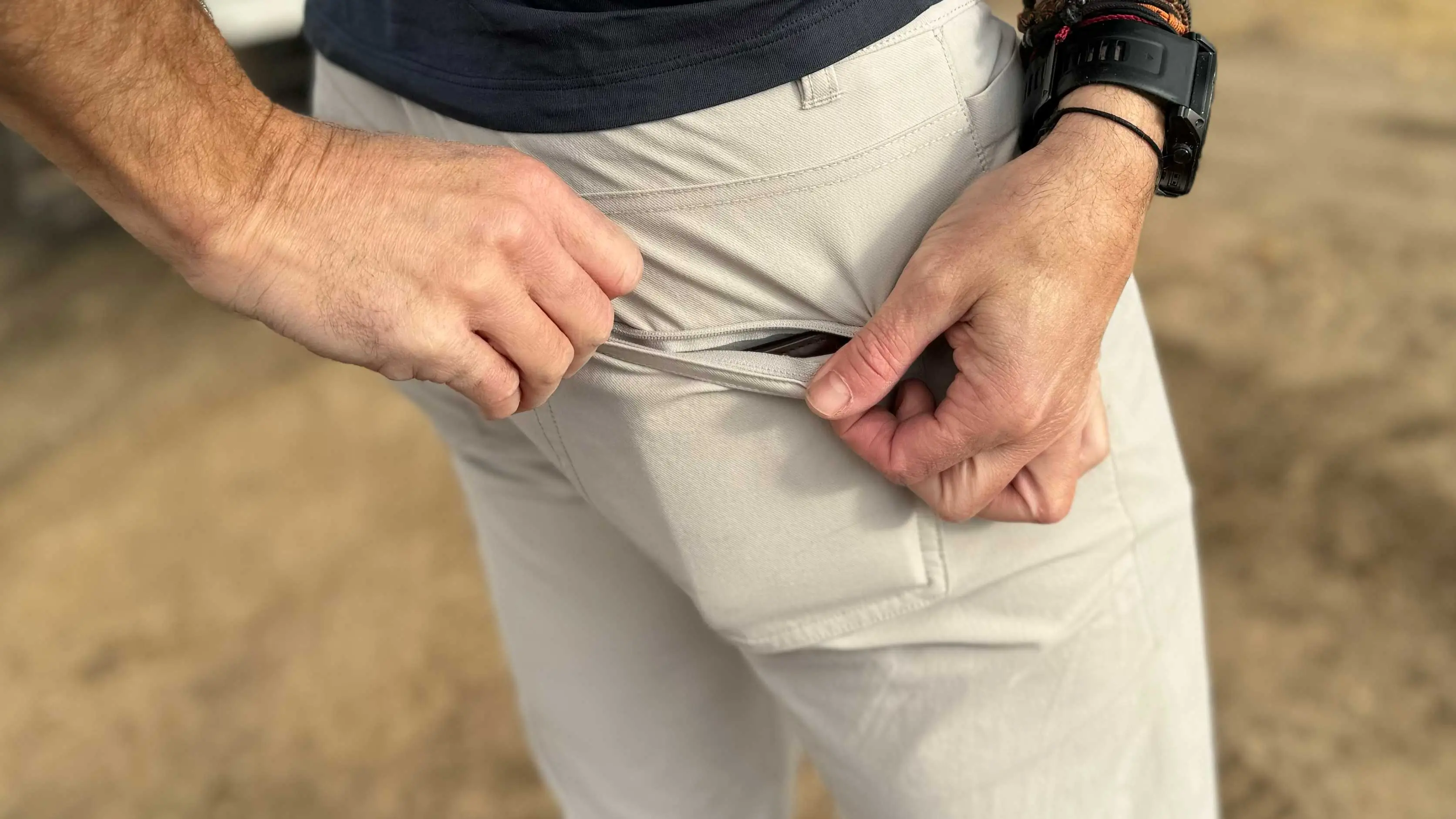 a detail of the rear pocket that zips closed to secure your documents