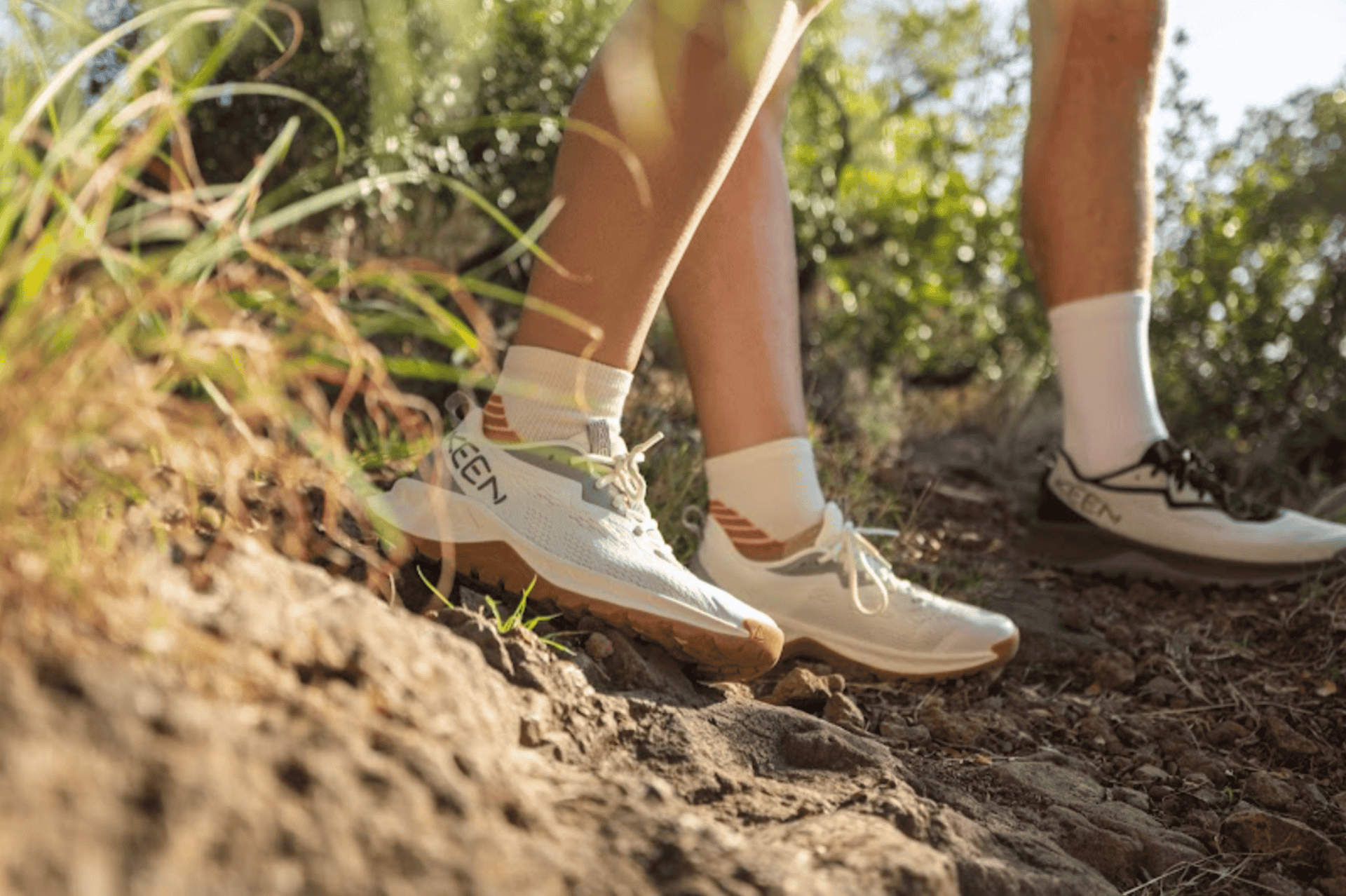 People wearing KEEN Versacore shoes outside