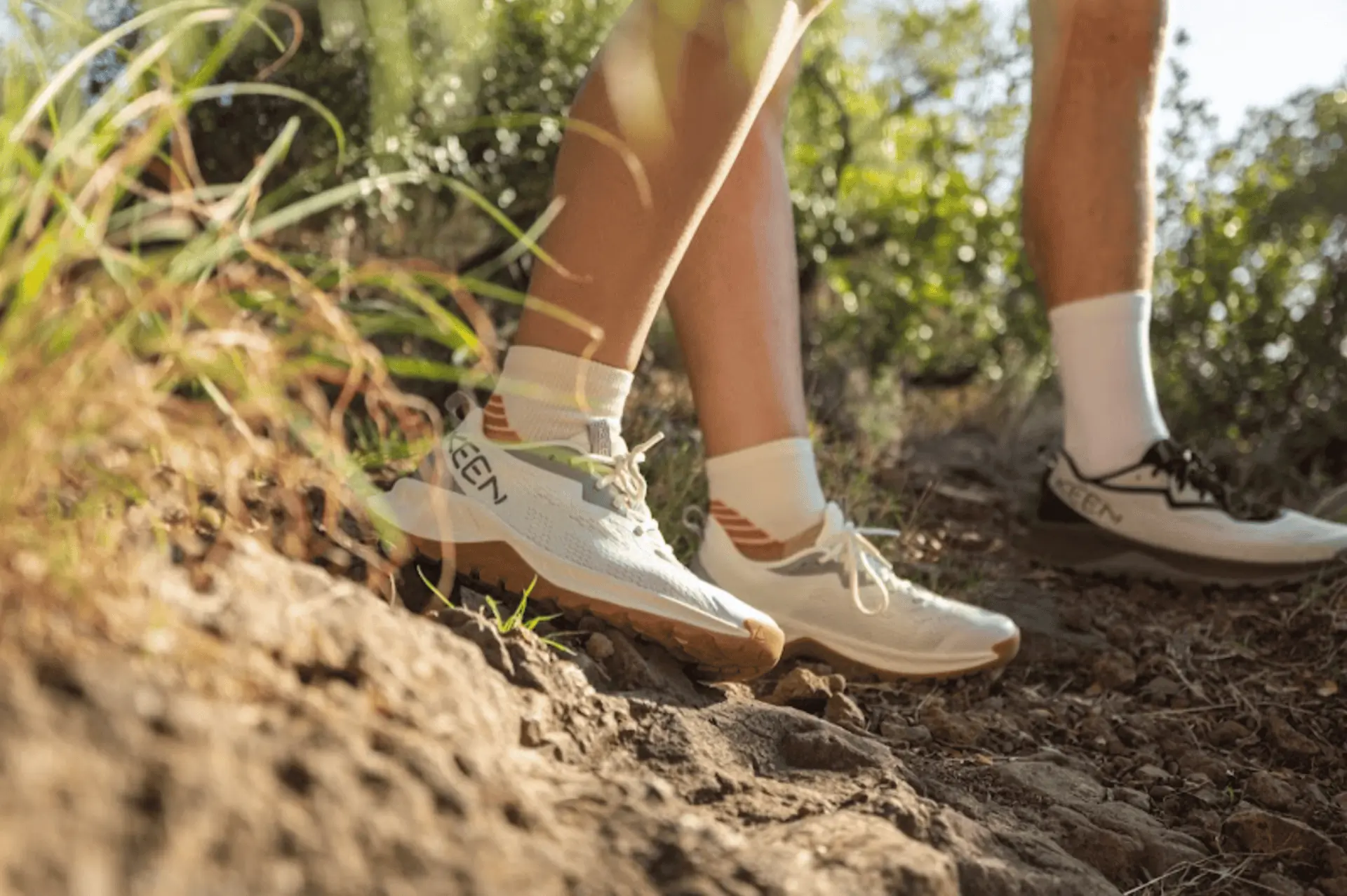 People wearing KEEN Versacore shoes outside