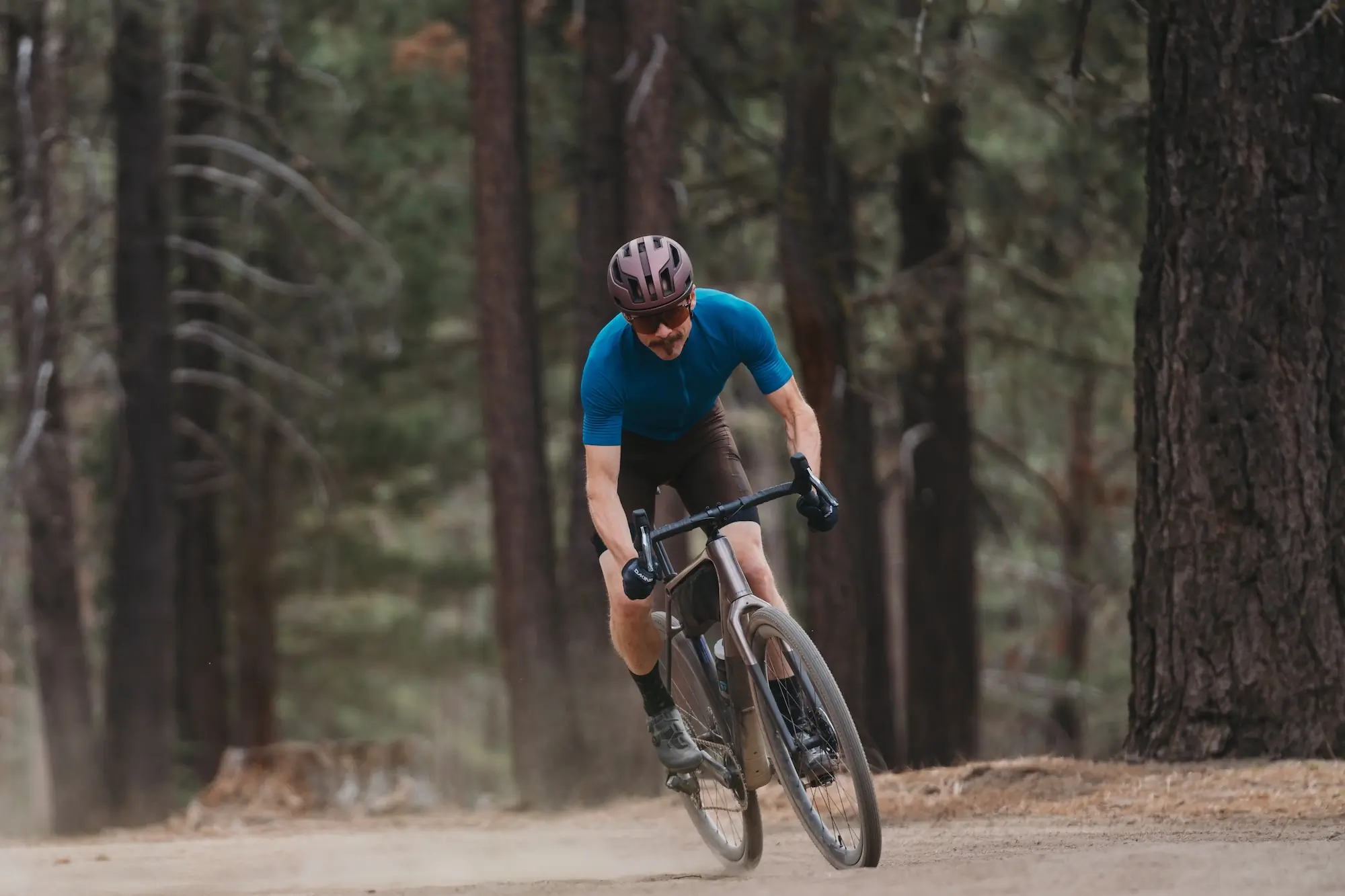 Riding a gravel bike while wearing the Sweet Protection Falconer 2Vi MIPS