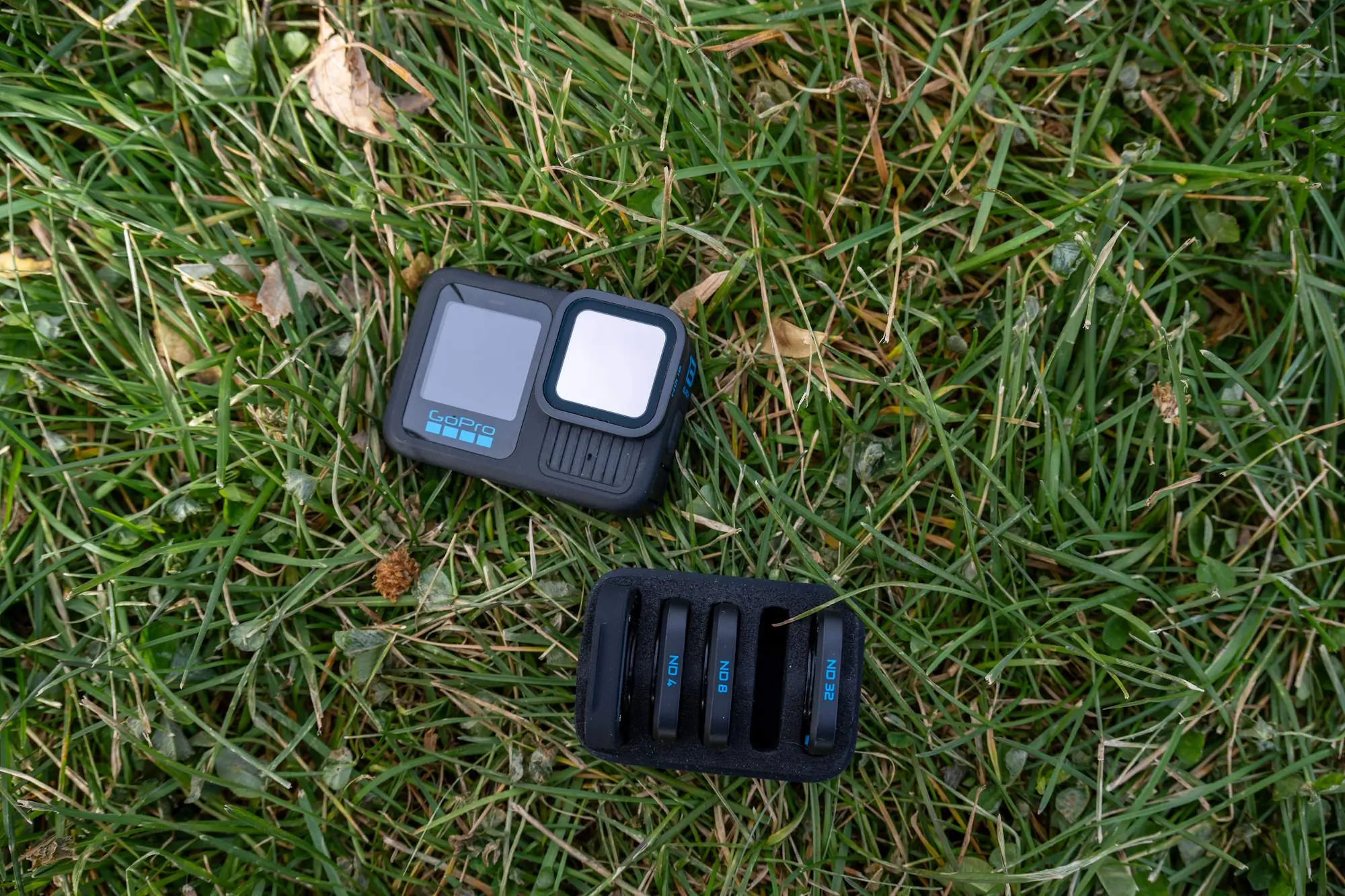 GoPro HERO13 camera and ND filter set placed on grass