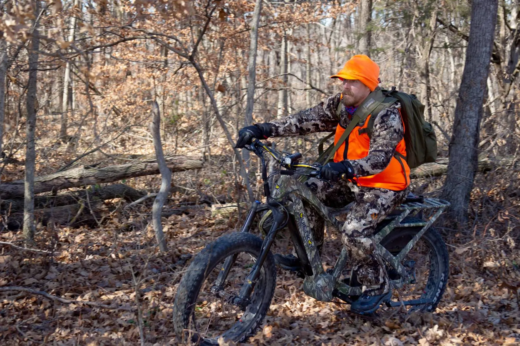 Sean McCoy riding a QuietKat Apex Pro hunting e-bike on a hunt