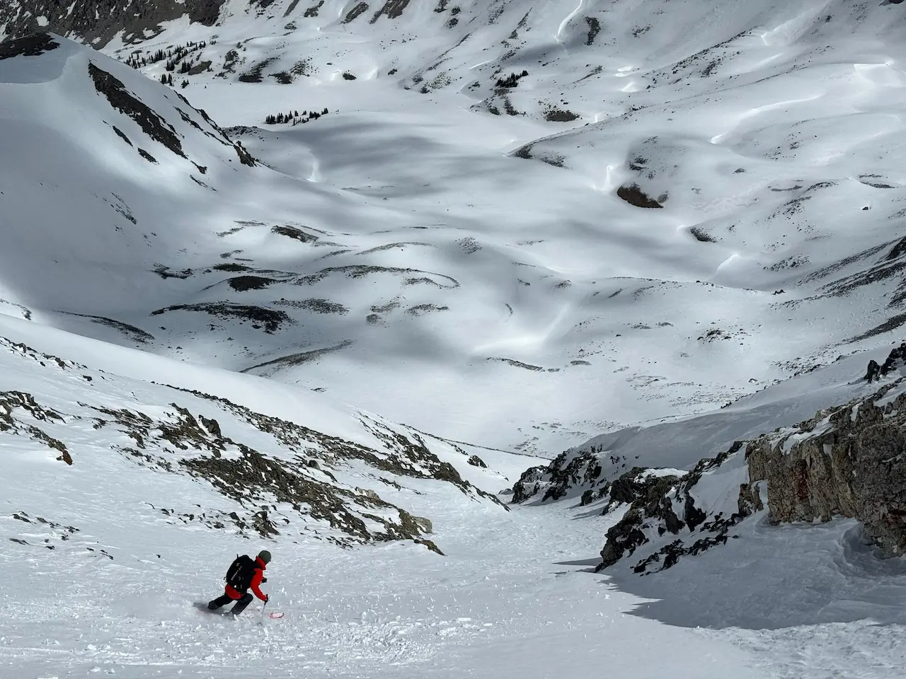 wearing scott patrol e2 30 kit pack while skiing