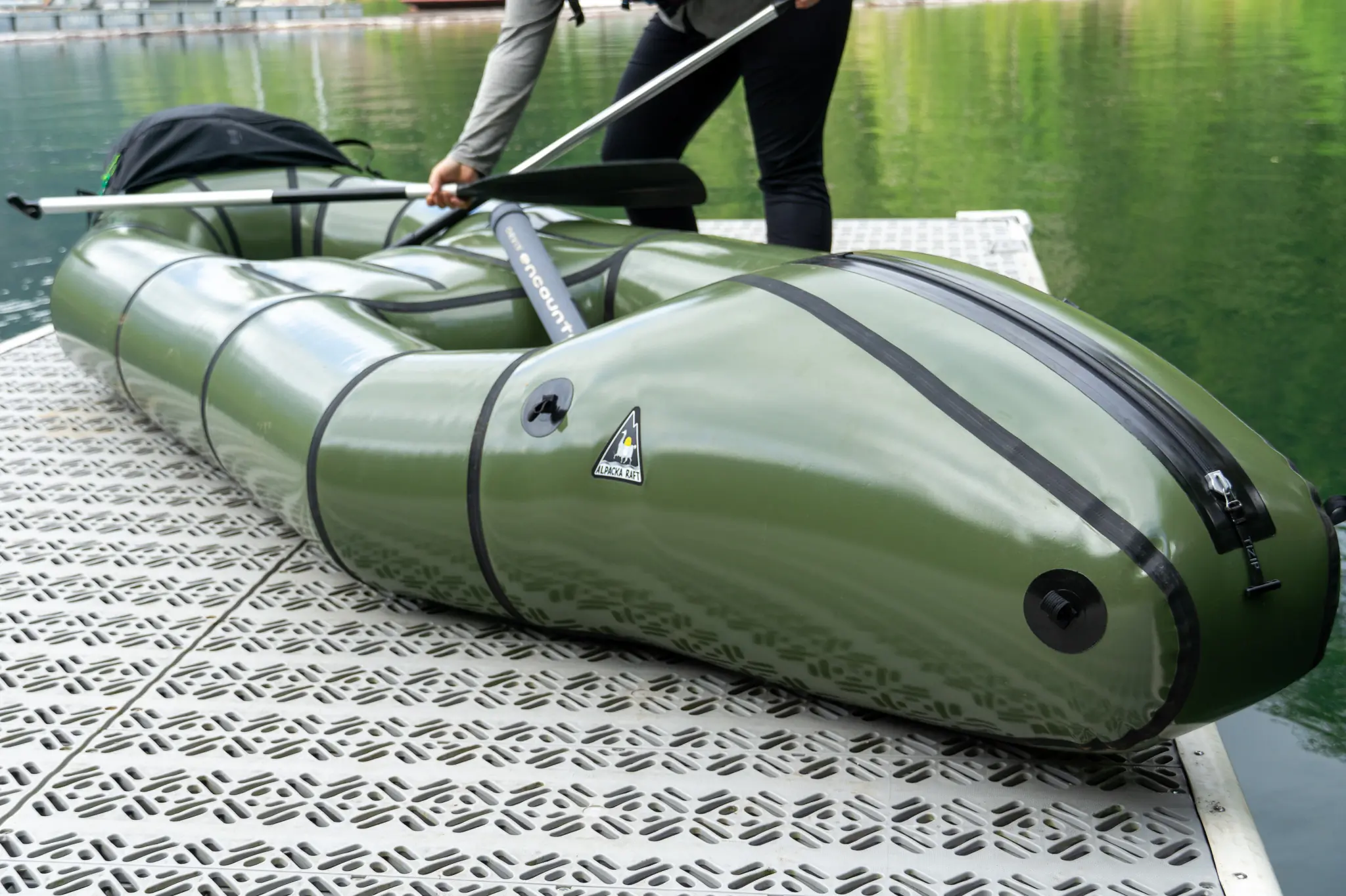 the alpacka raft rendezvous from the rear, while being prepared on a dock