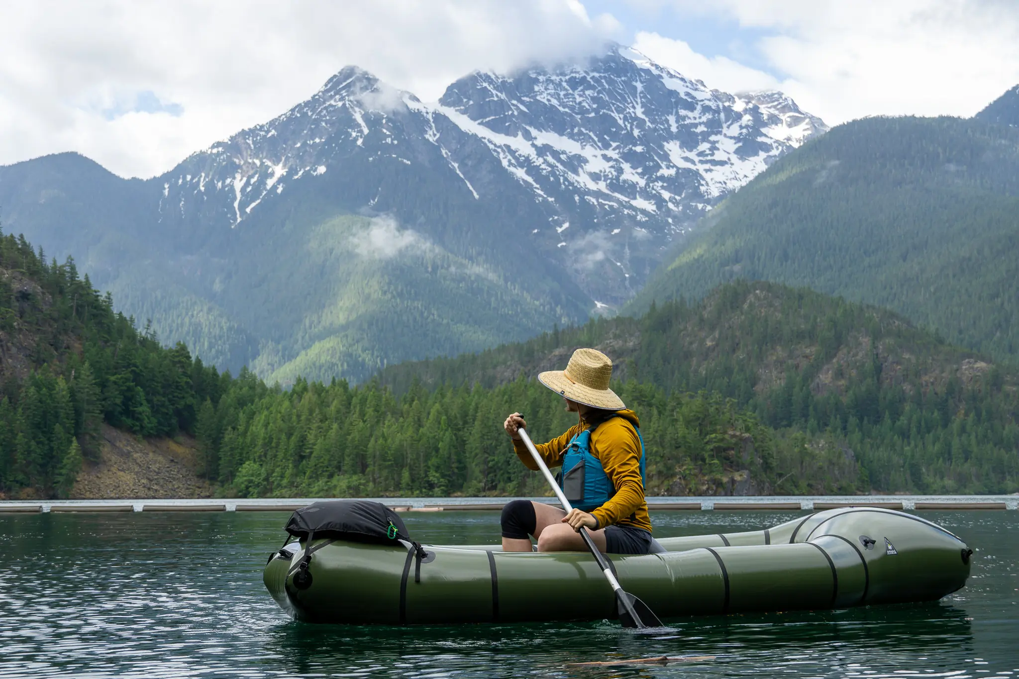 a solo paddler in the rendezvous beneath a north cascades peak