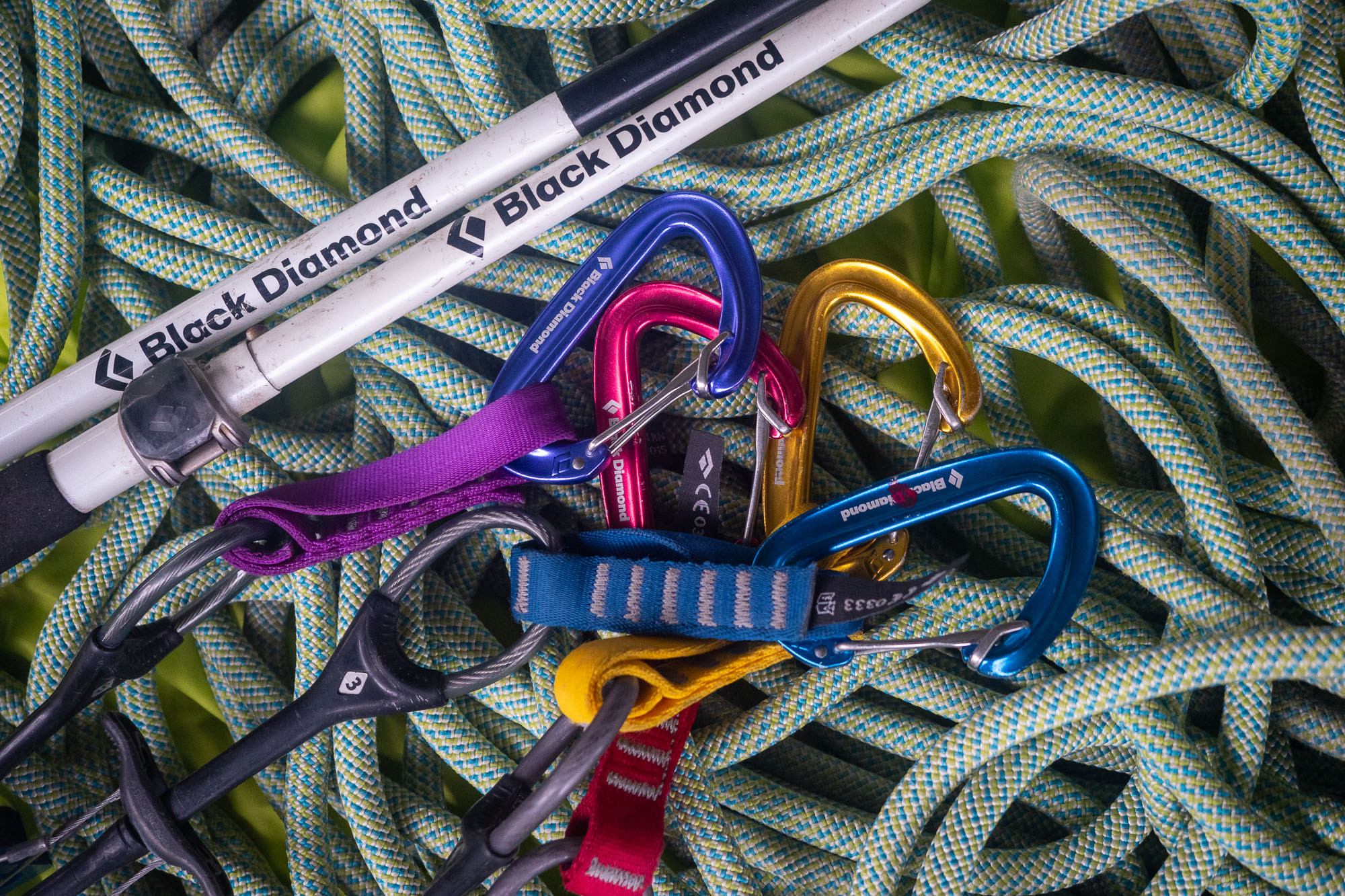 Black Diamond carabiners and trekking poles on a climbing rope