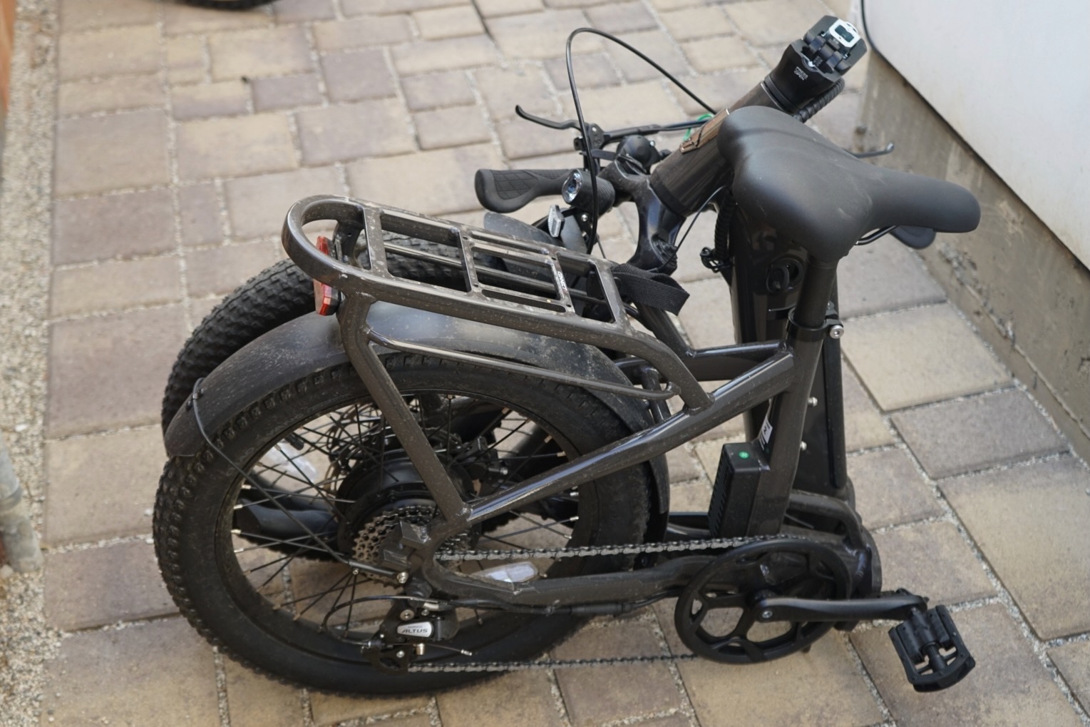 The Ride1Up Portola folding electric bike in its folded configuration