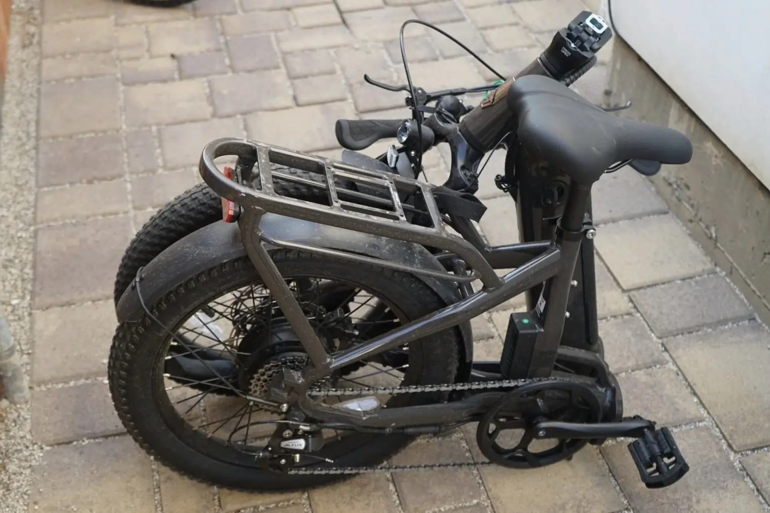 The Ride1Up Portola folding electric bike in its folded configuration