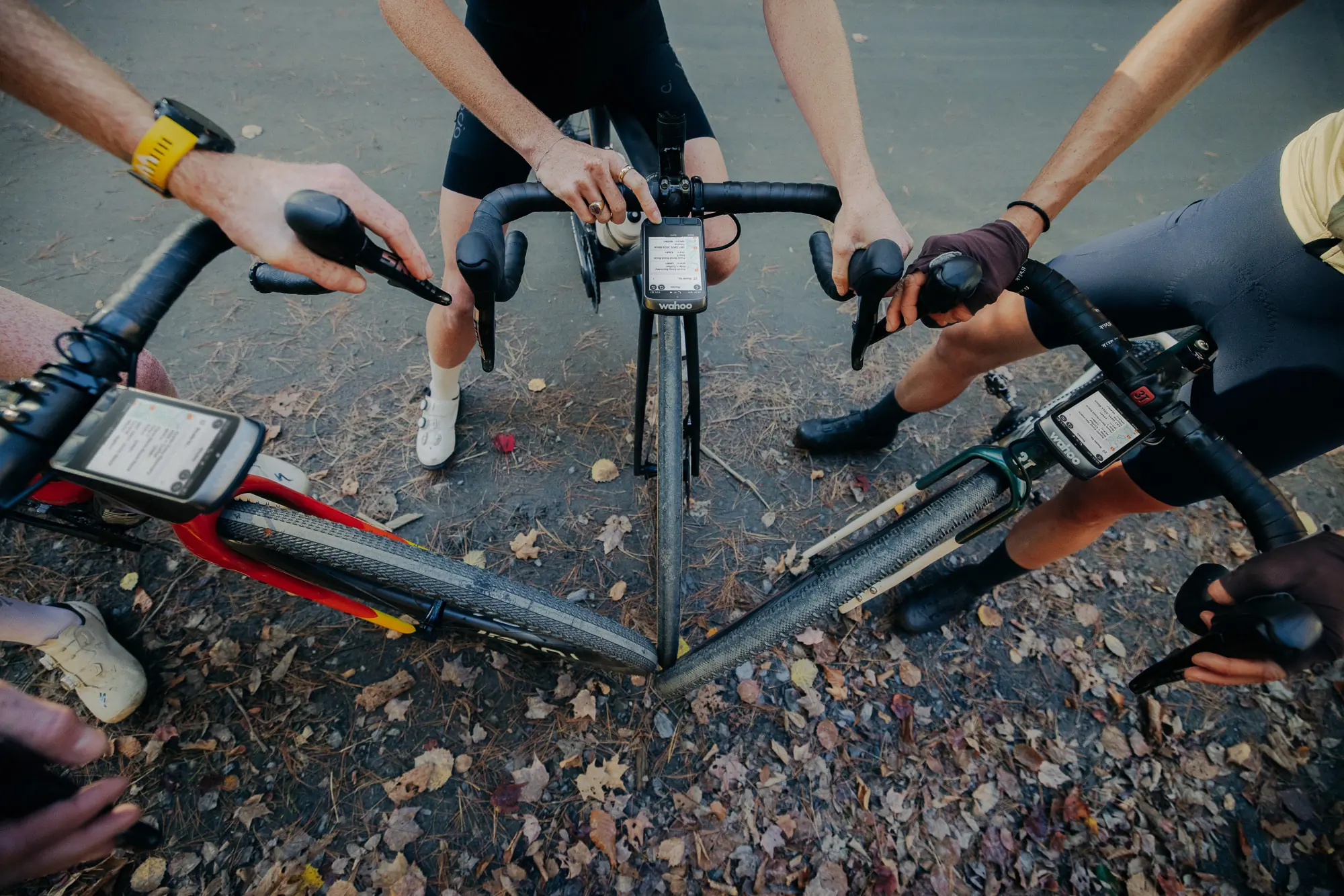 3 cyclists with Wahoo ELEMNT Ace bike computers