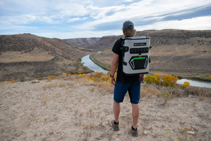 man wearing Engel Roll Top High Performance Backpack Cooler