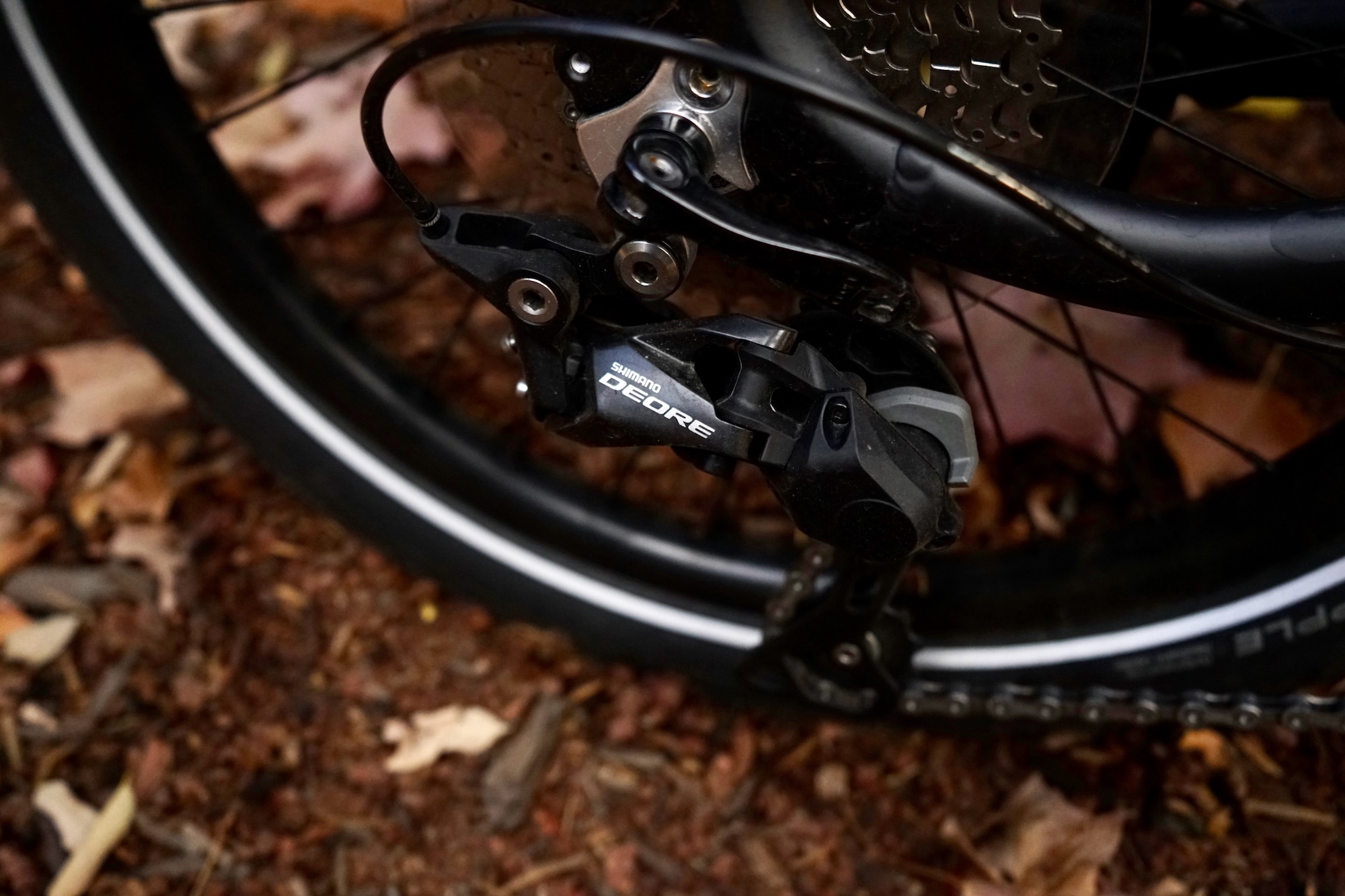 Close-up of the Shimano Deore derailleur on the Tern Vektron S10 folding electric bike