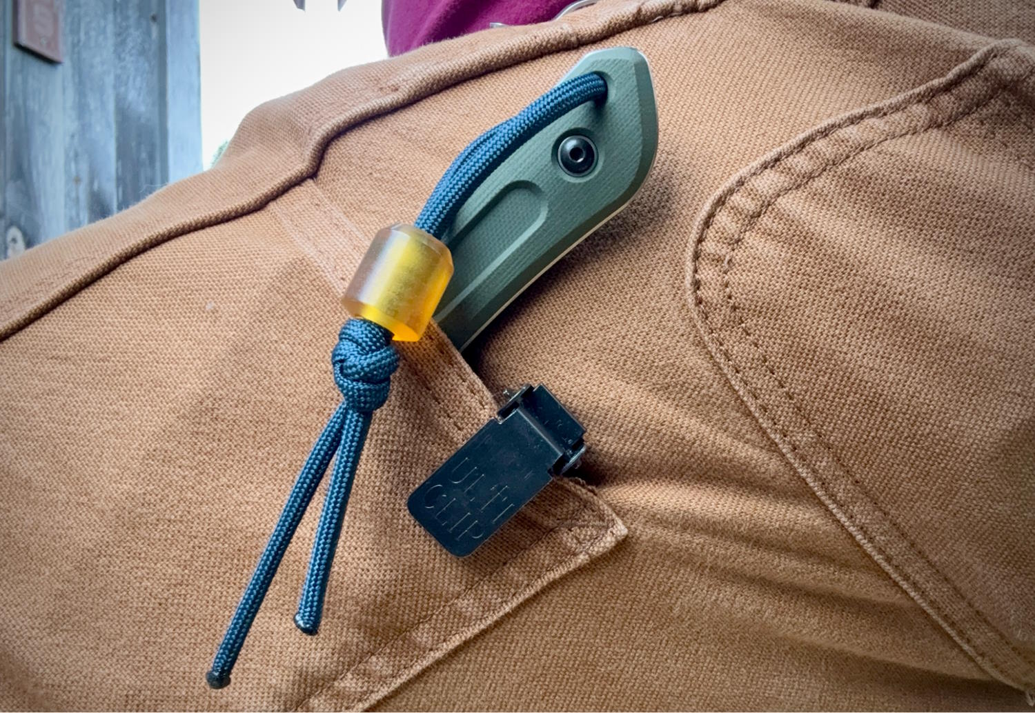 Closeup of pocket clip mounted to a pocket