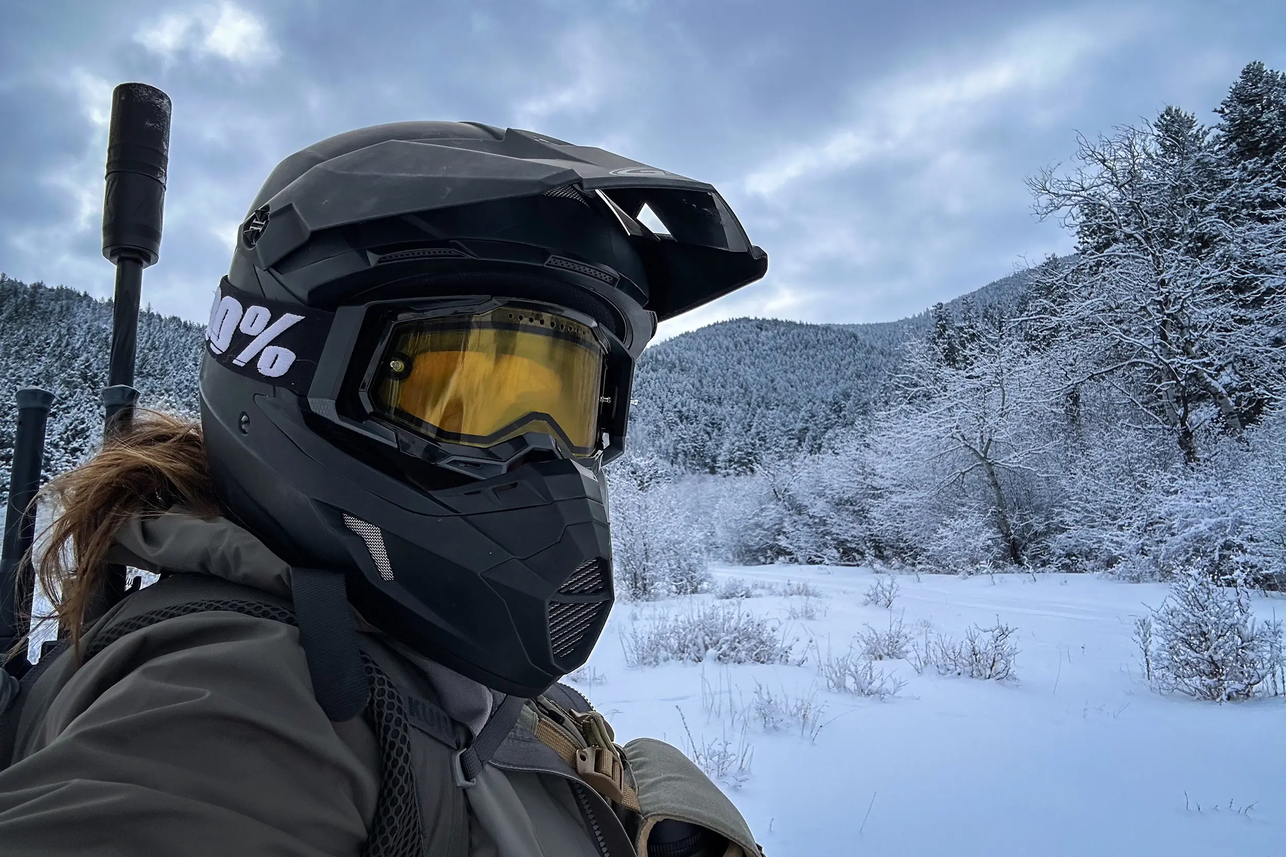 Predator Hunting on Snowmobile with the Havak SLAM in my pack; (photo/Rachelle Schrute)