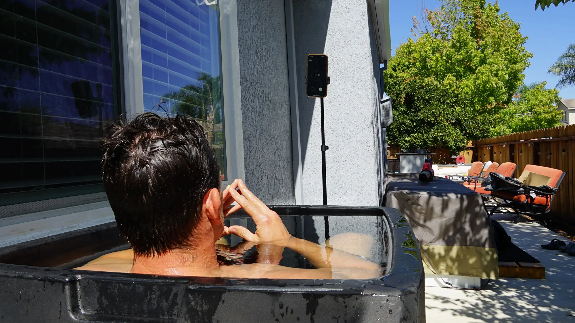 Man in ice barrel chiller