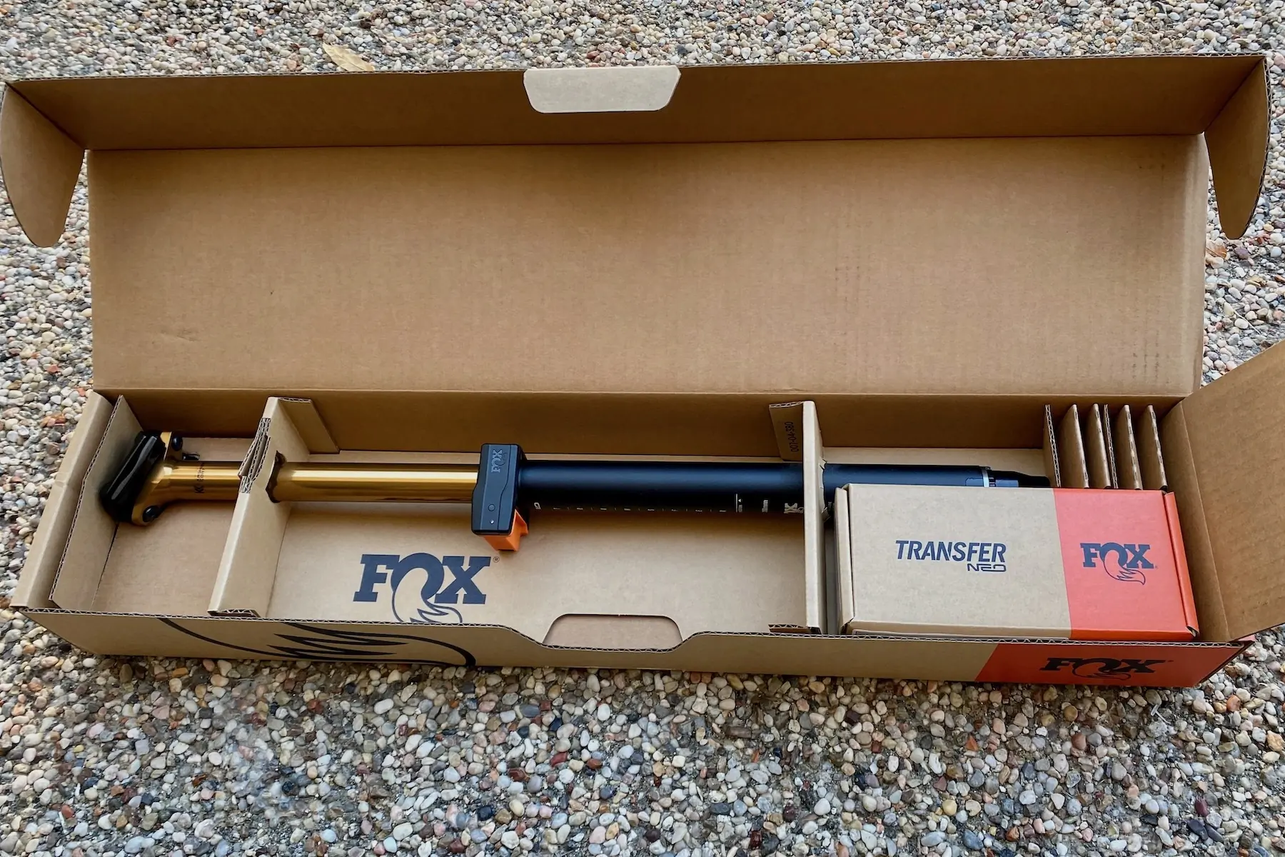 The Fox Transfer Neo seatpost in the box