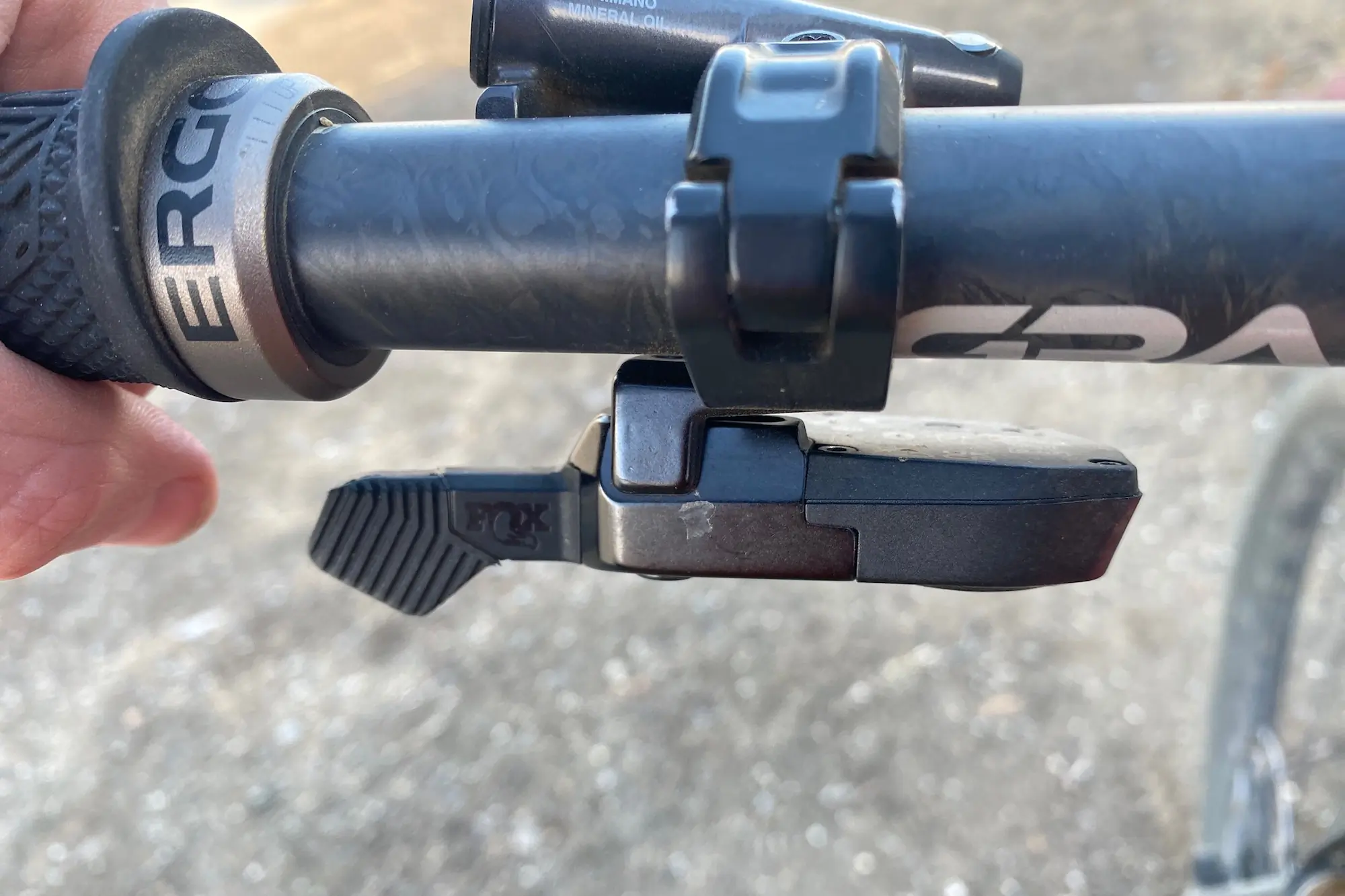 A close-up of the Fox Transfer Neo remote