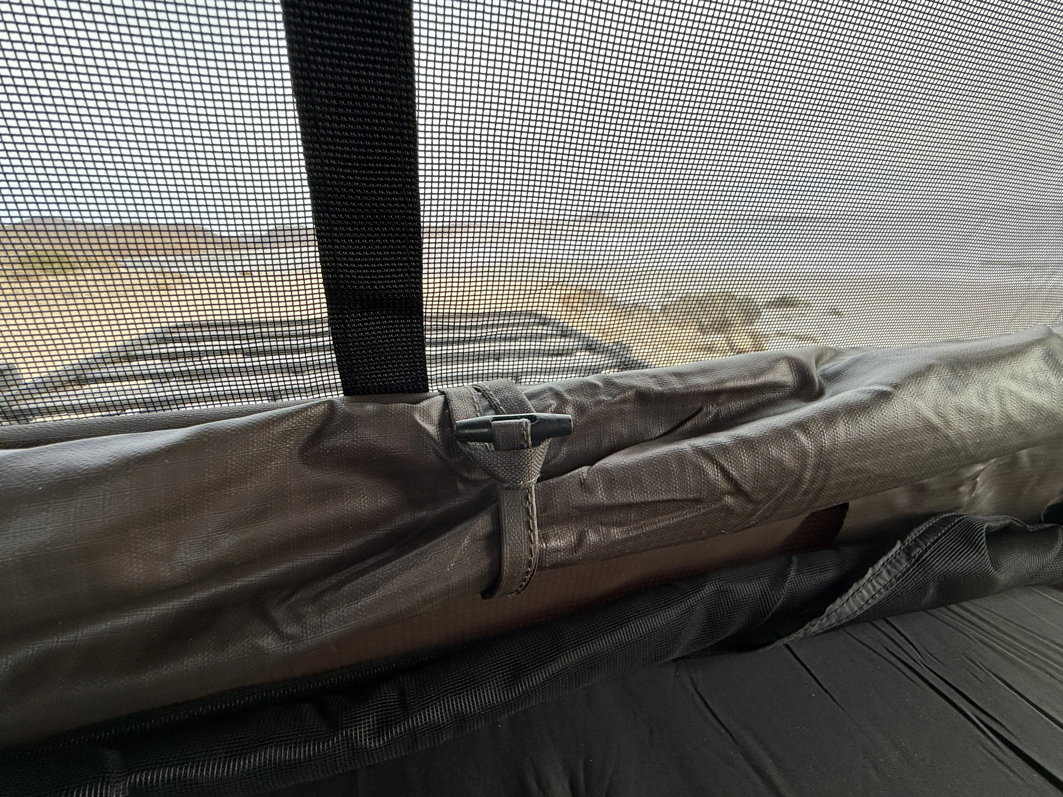 rolled up and secured solid wall  inside the Dometic TRT 140 Air