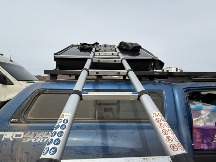 The Dometic TRT 140 Air Inflatable Rooftop Tent ladder