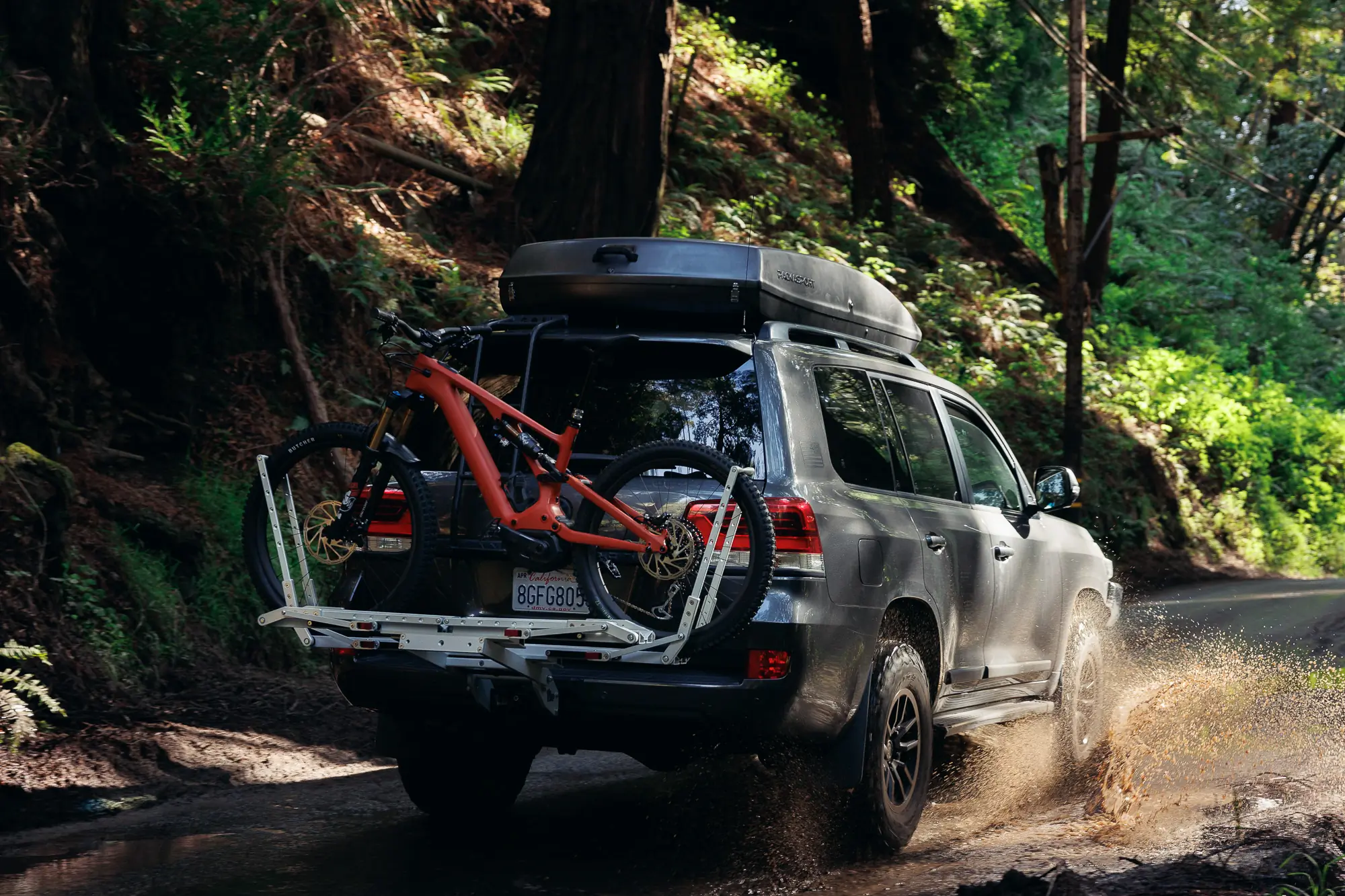 1UP USA Super Duty bicycle hitch rack on an SUV