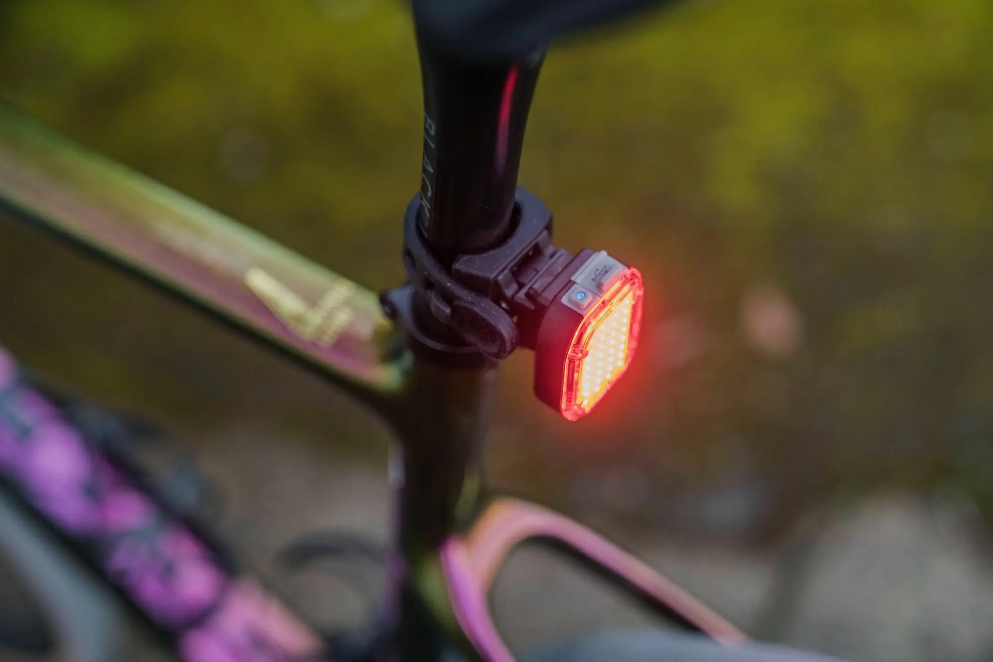 The NiteRider Vmax+ 150 mounted on a road bike and lit up in its brightest mode