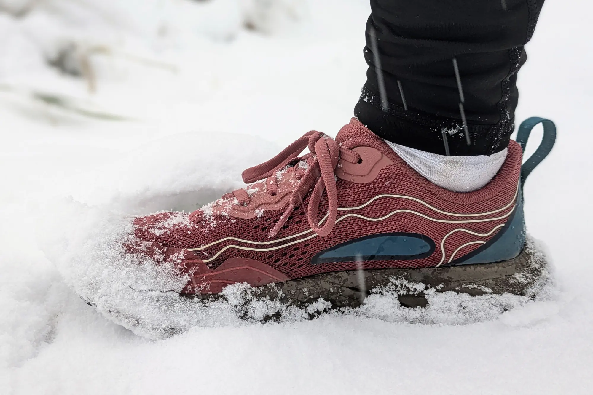 Teva Trailwinder Low Hiking Shoe covered in snow during use