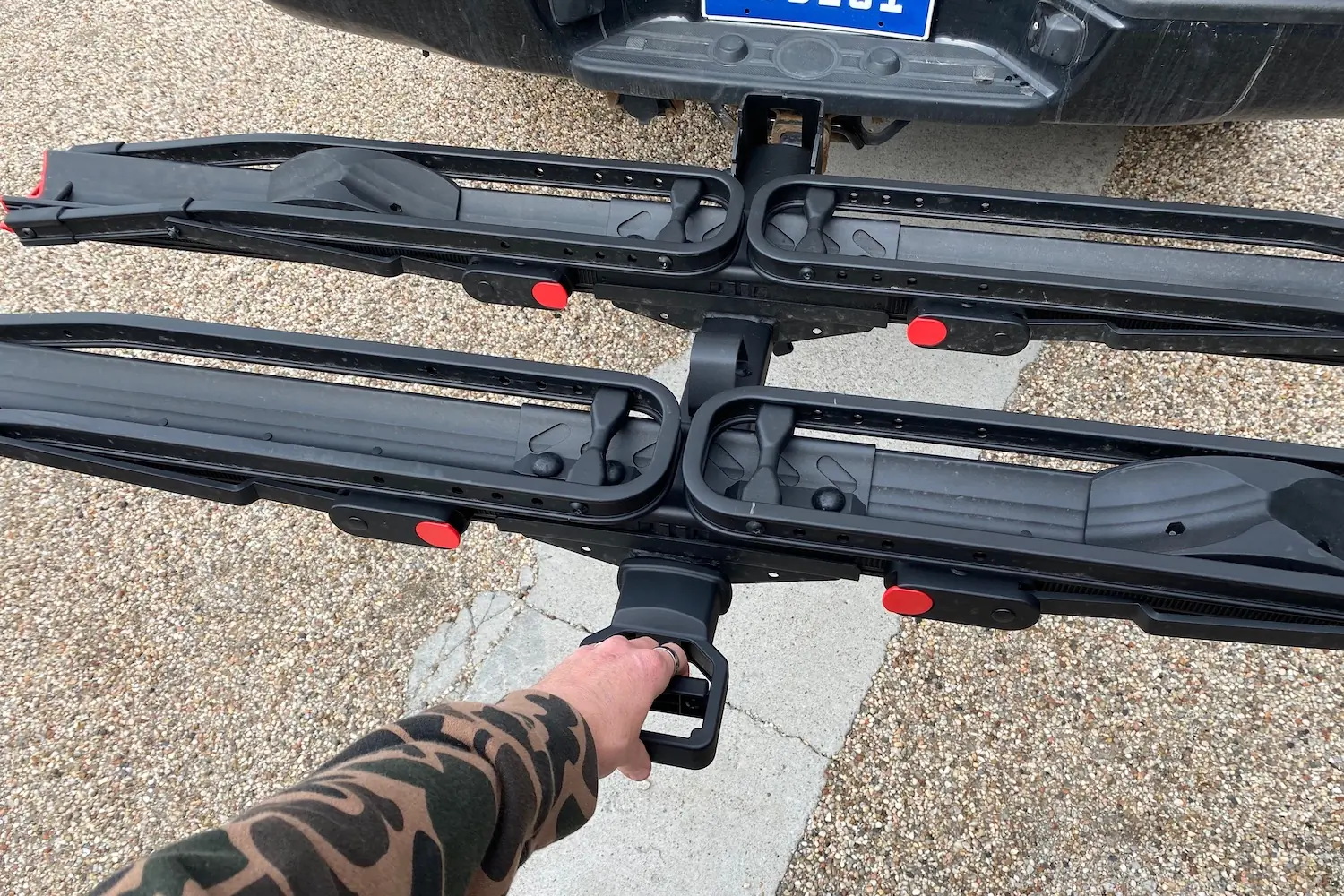 Using the convenient tilt adjustment handle on the Hollywood Racks CrossTrack