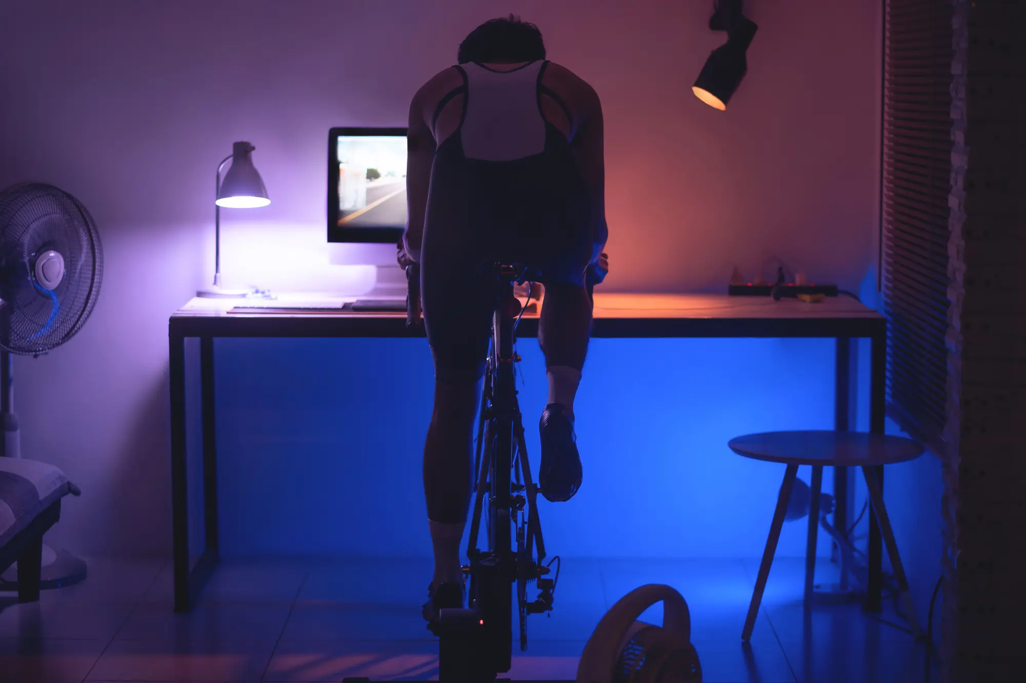 man cycling indoors