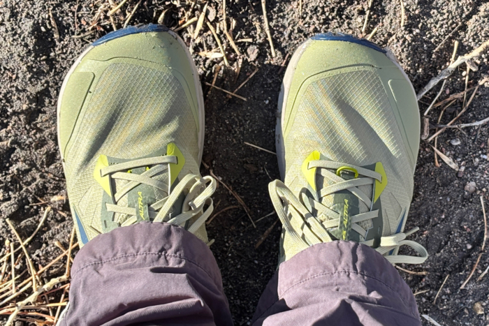 A top-down view of Altra Lone Peak 9, showing its wide toe box and trail-ready design.