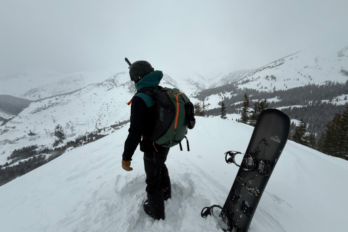 Person wearing the BCA Float E2-35 Avalanche Airbag on a snowy ridge