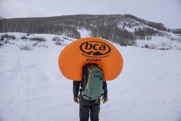 BCA Float E2-35 Avalanche Airbag deployed with bright orange balloon