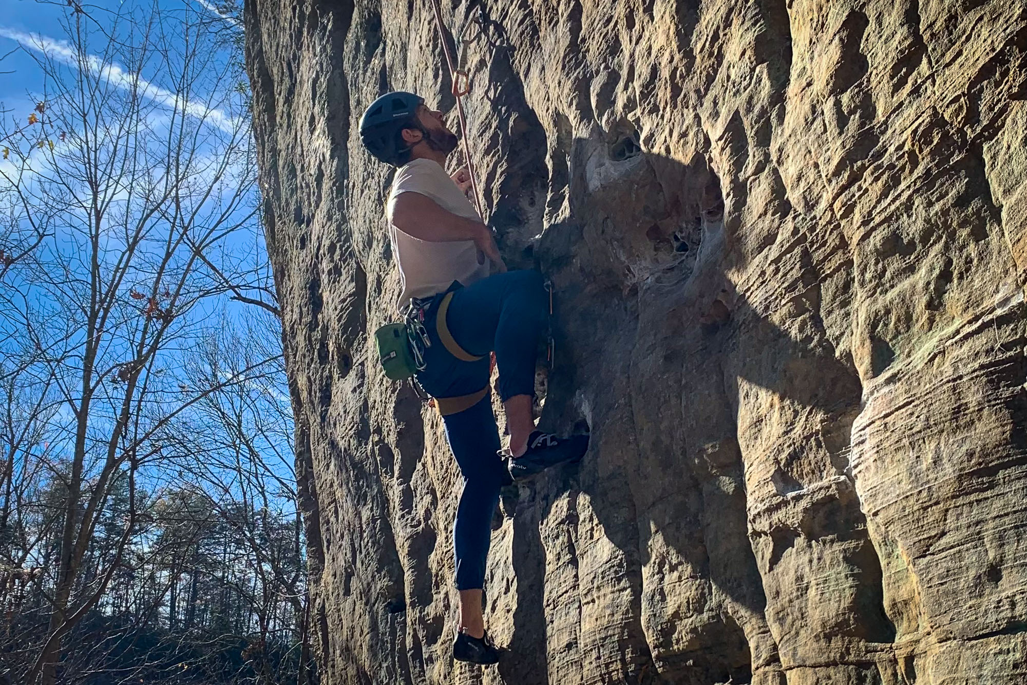 Rock climber leading at the Red River Gorge