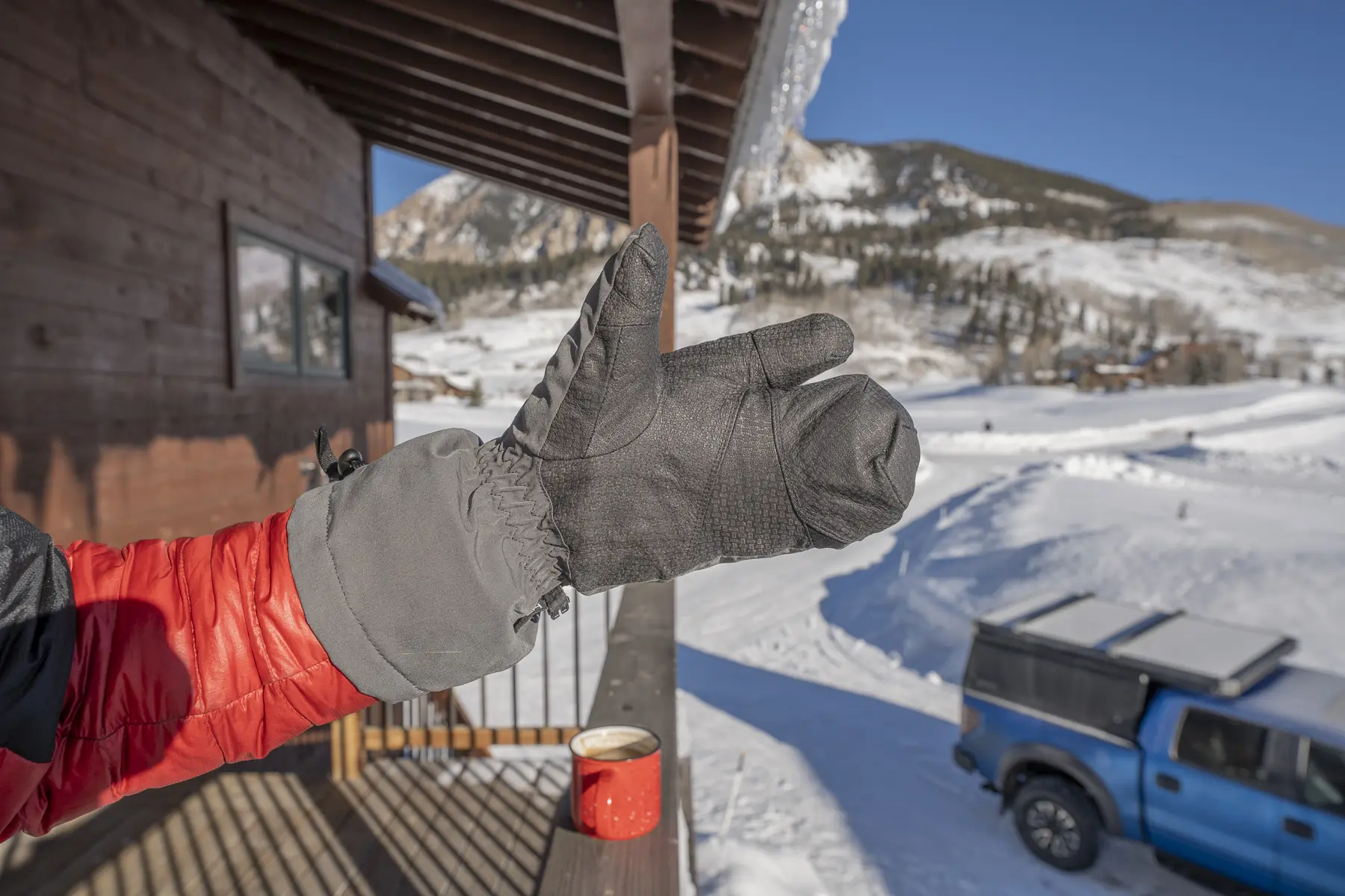 A close-up of a Kuiu Northstar Glomitt, showing its textured grip and mitten design