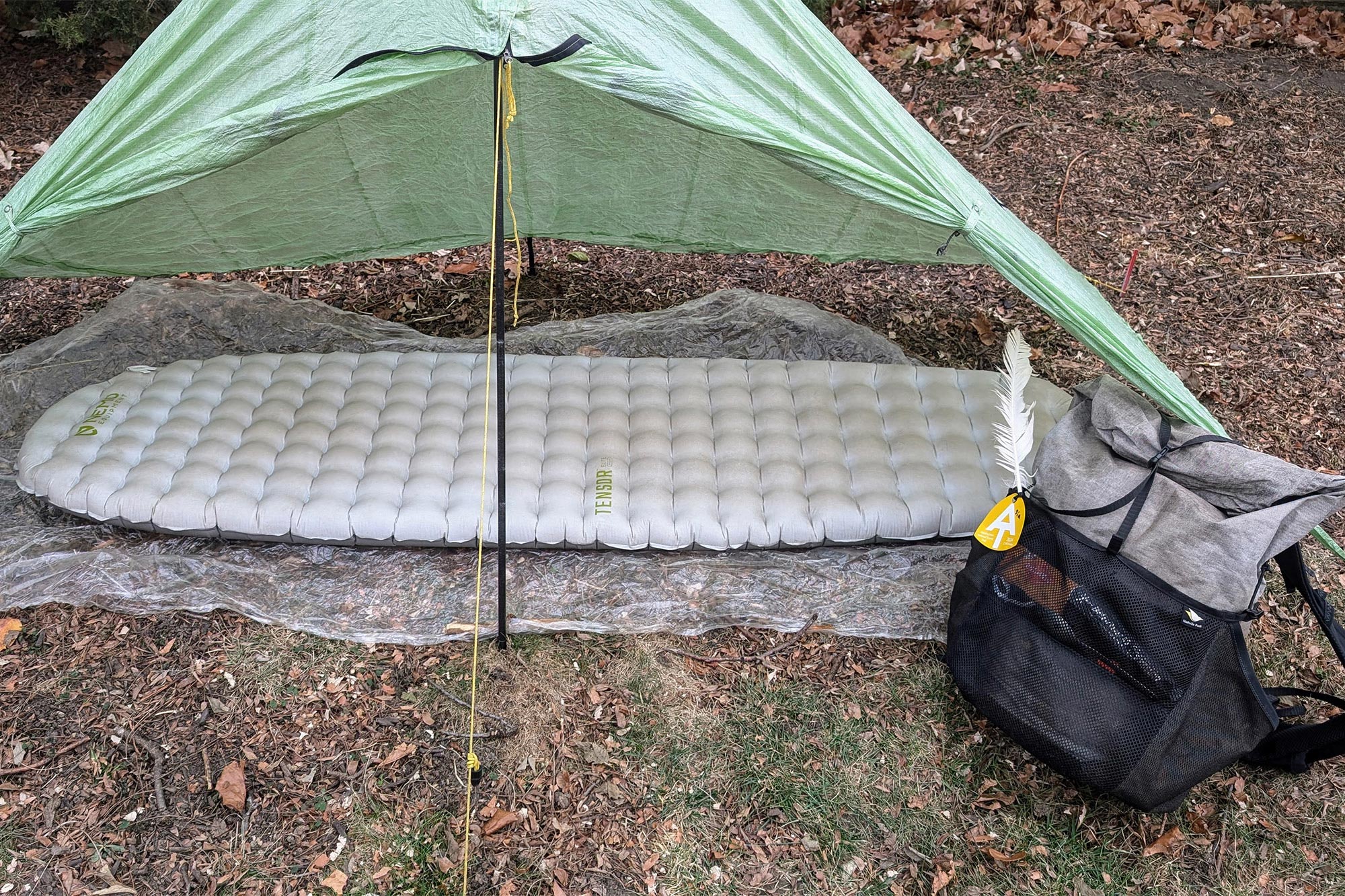 NEMO Tensor Elite Sleeping Pad set up under a tarp shelter