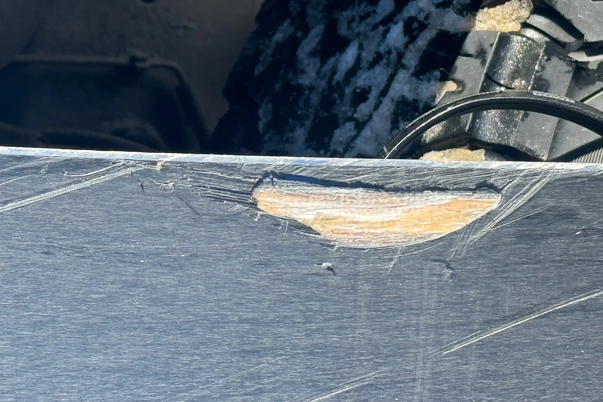 Close-up of Edge Damage and Wear on Never Summer Nohku