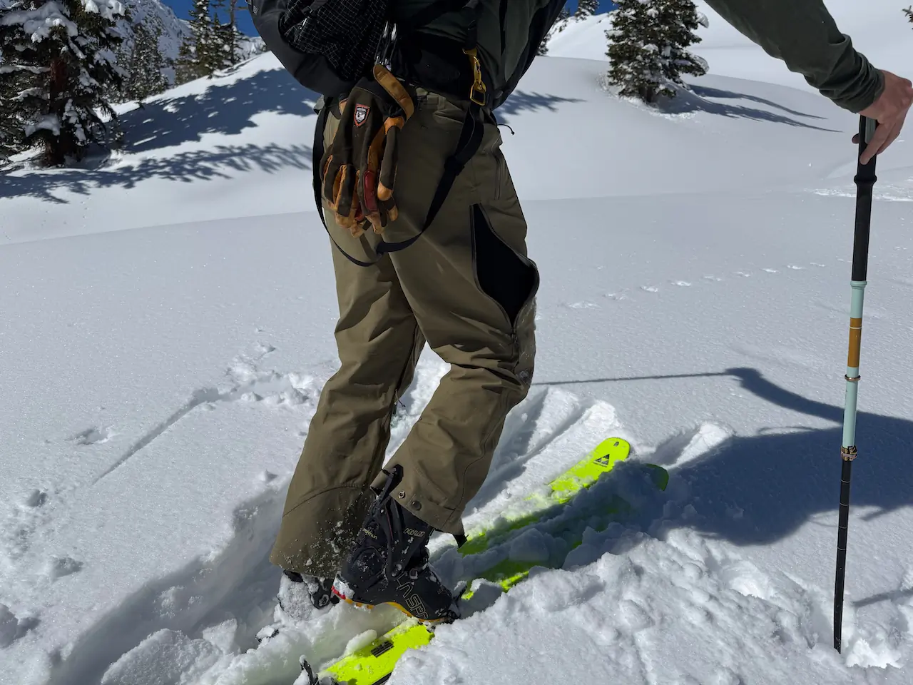 la sportiva kilo paired with skis on snow