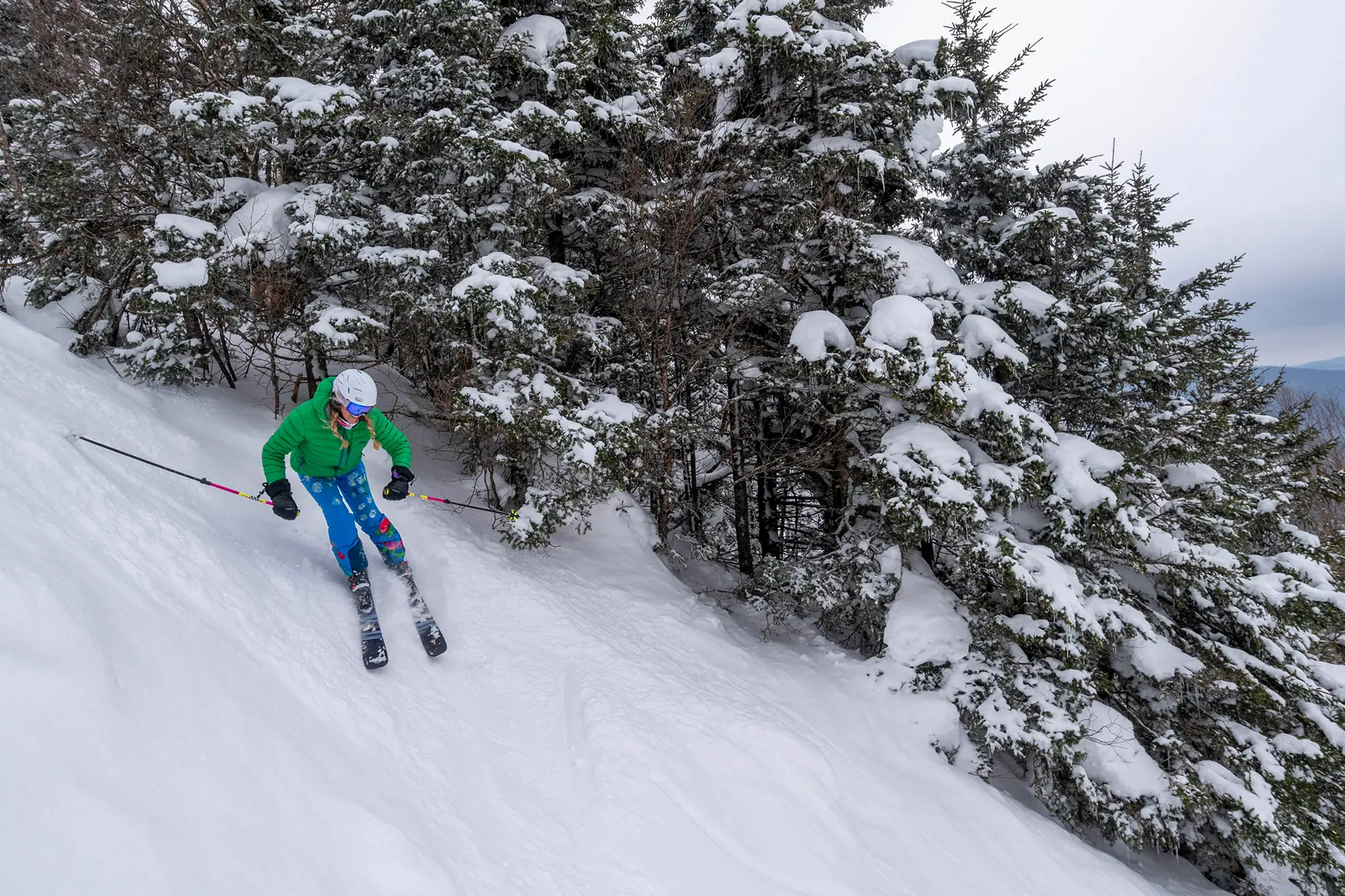 Atomic Maven 94 CTI skiing through snow-covered trees