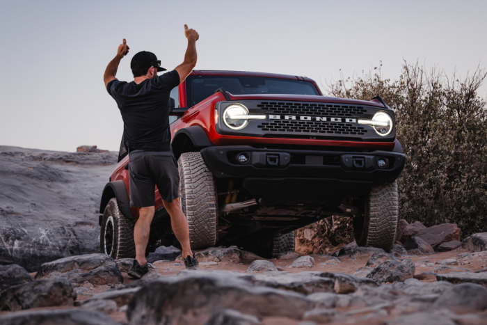 Ford Bronco overlanding, man gives thumbs up in front