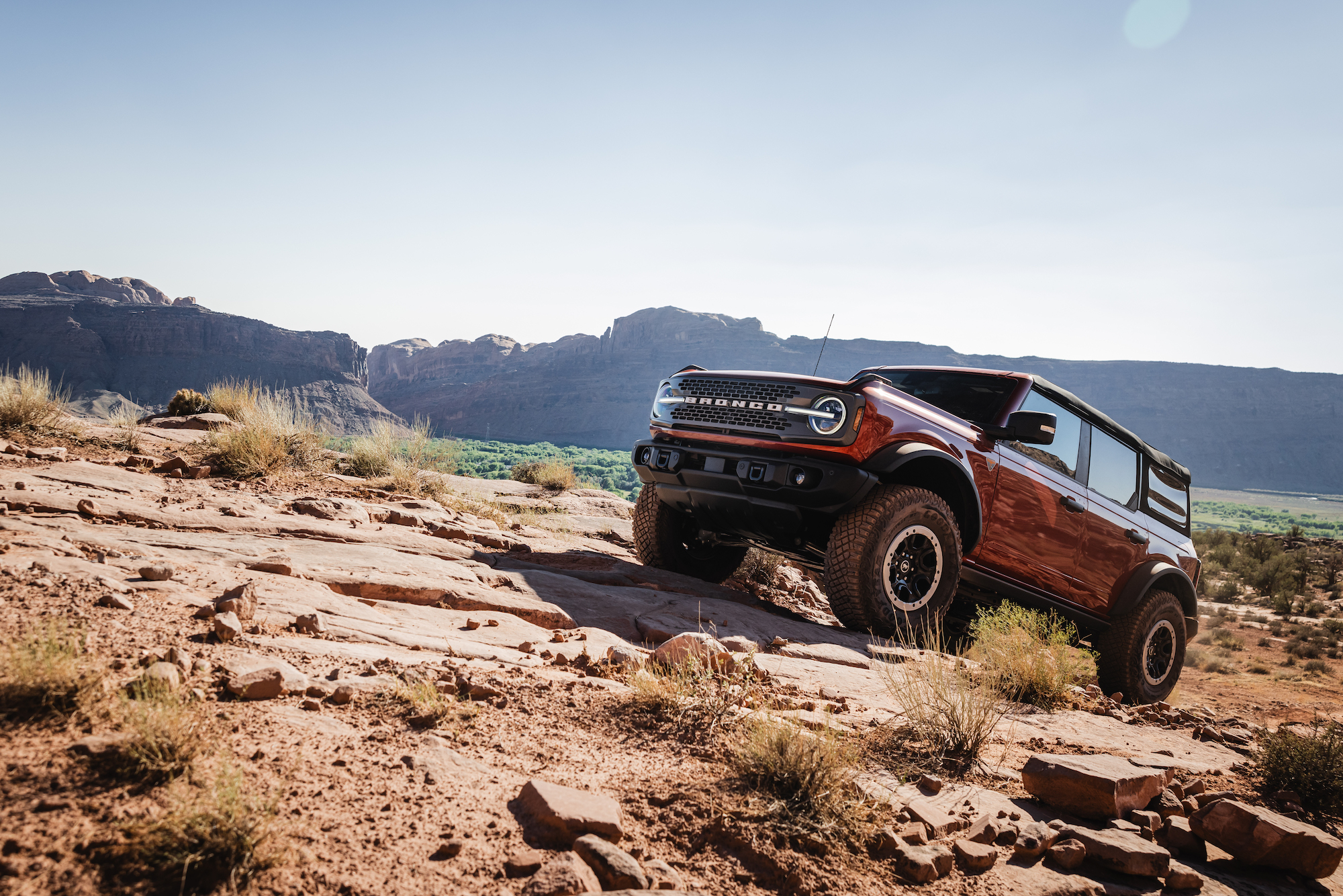 Bronco parked on red rock
