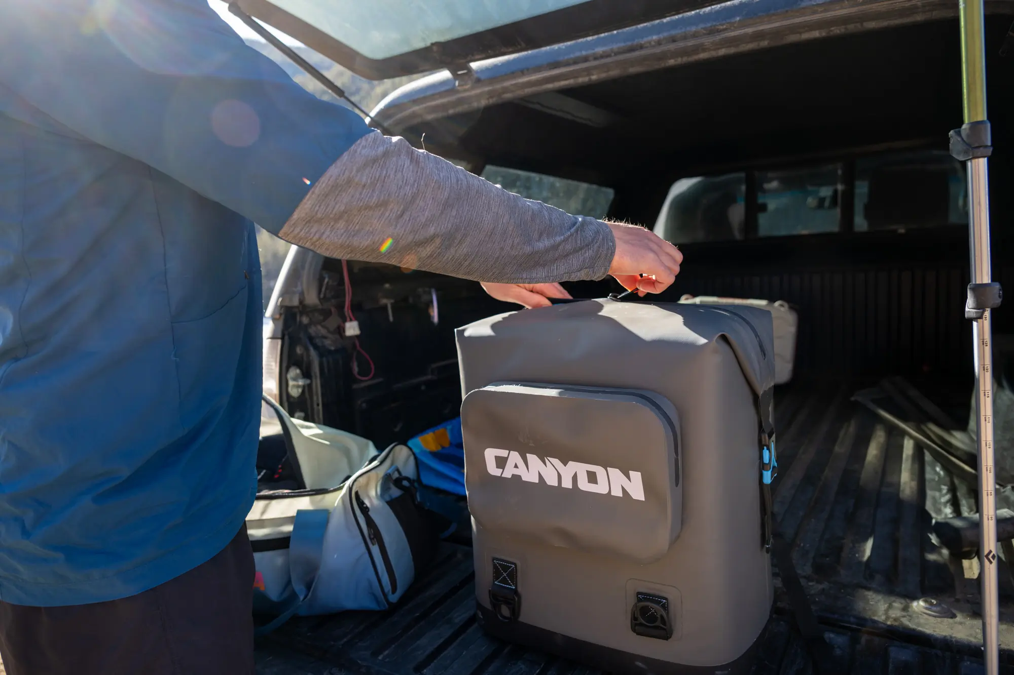Canyon Coolers Nomad Go Backpack Cooler on tail gate; PC Constance Mahoney