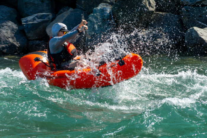 A packrafter negotiates a small rapid on the Chilliwack River