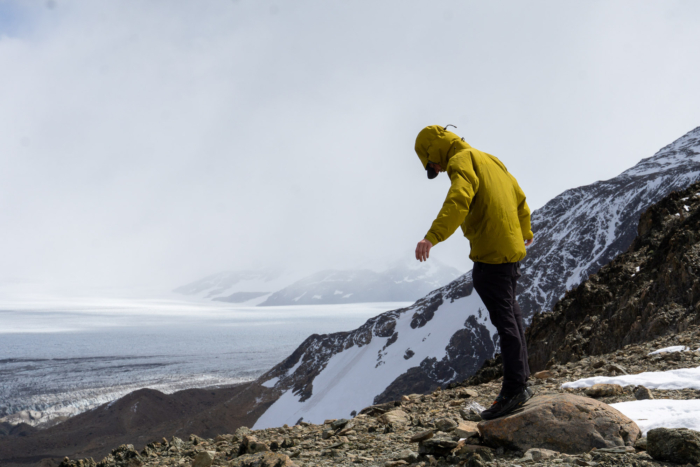 the author wearing an arc'teryx beta ar hardshell jacket in argentina above a glacier