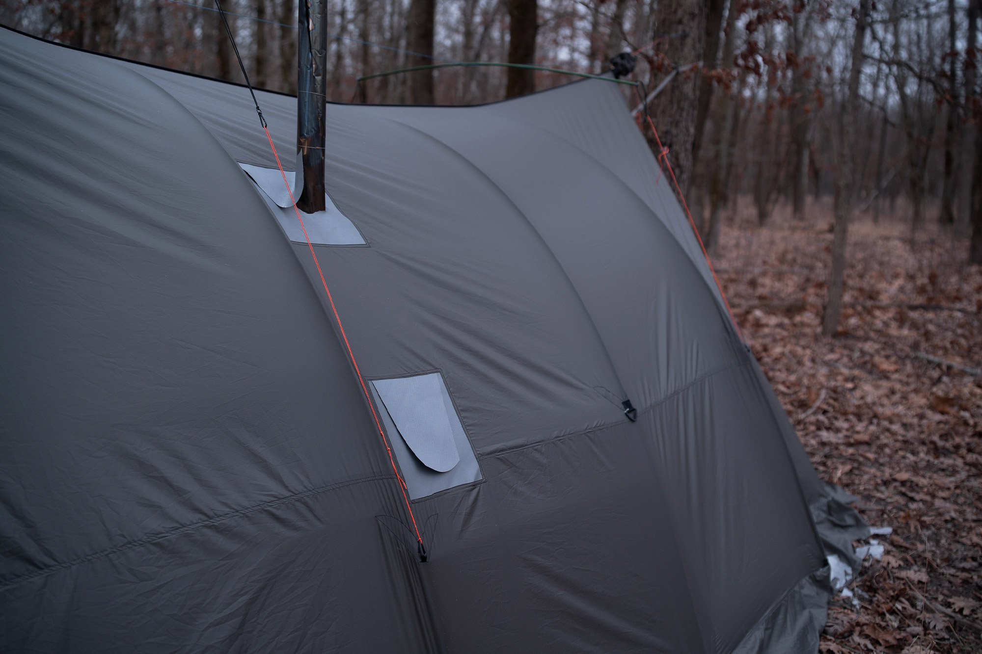 Warbonnet Tsunami tarp set up with extra poles for added support