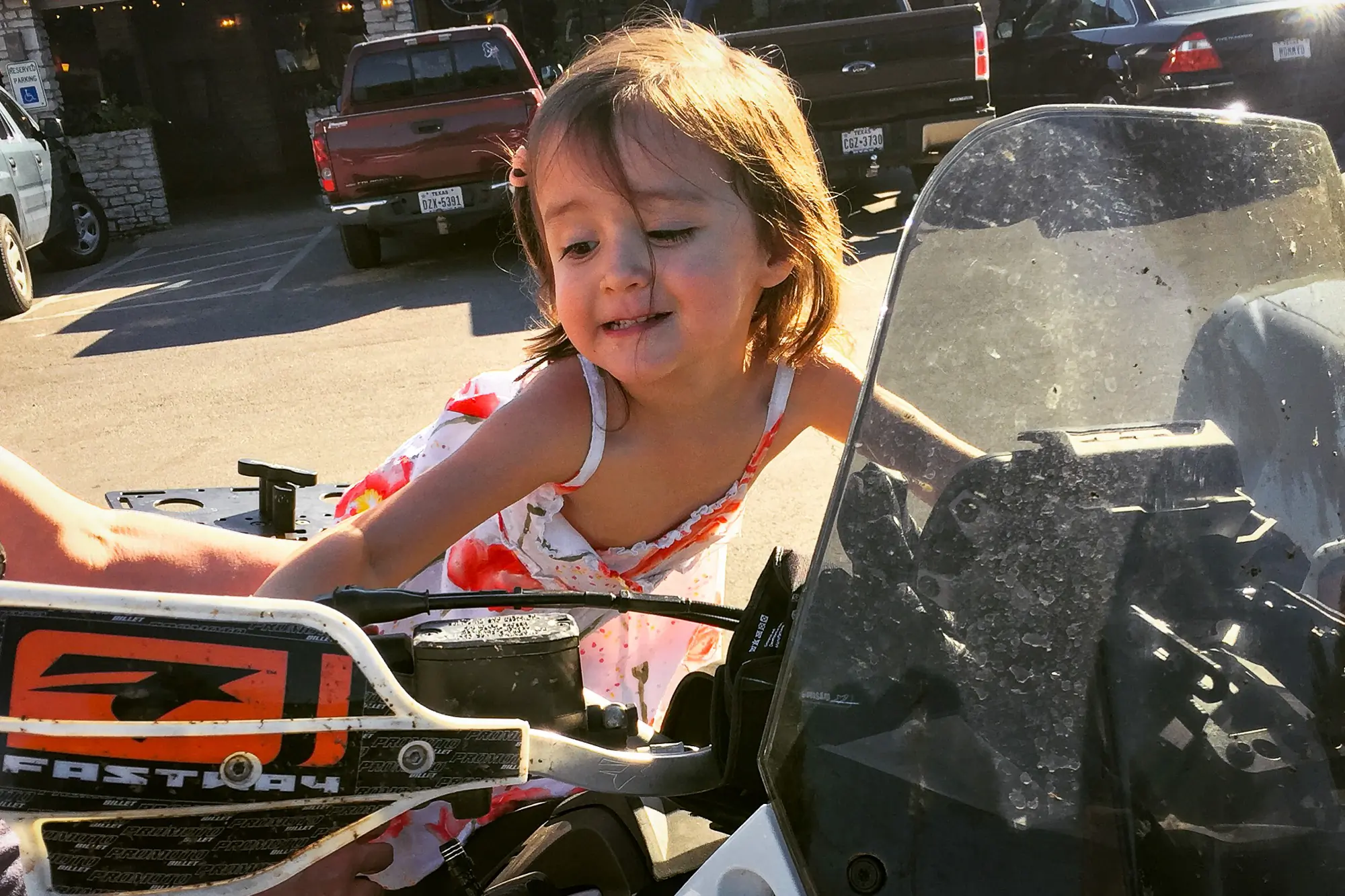 3 year old girl on motorcycle