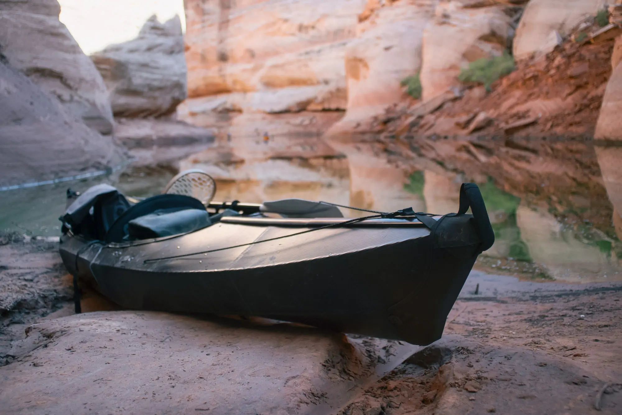 The Oru Beach LT Sport kayak beached on a shoreline in a slot canyon