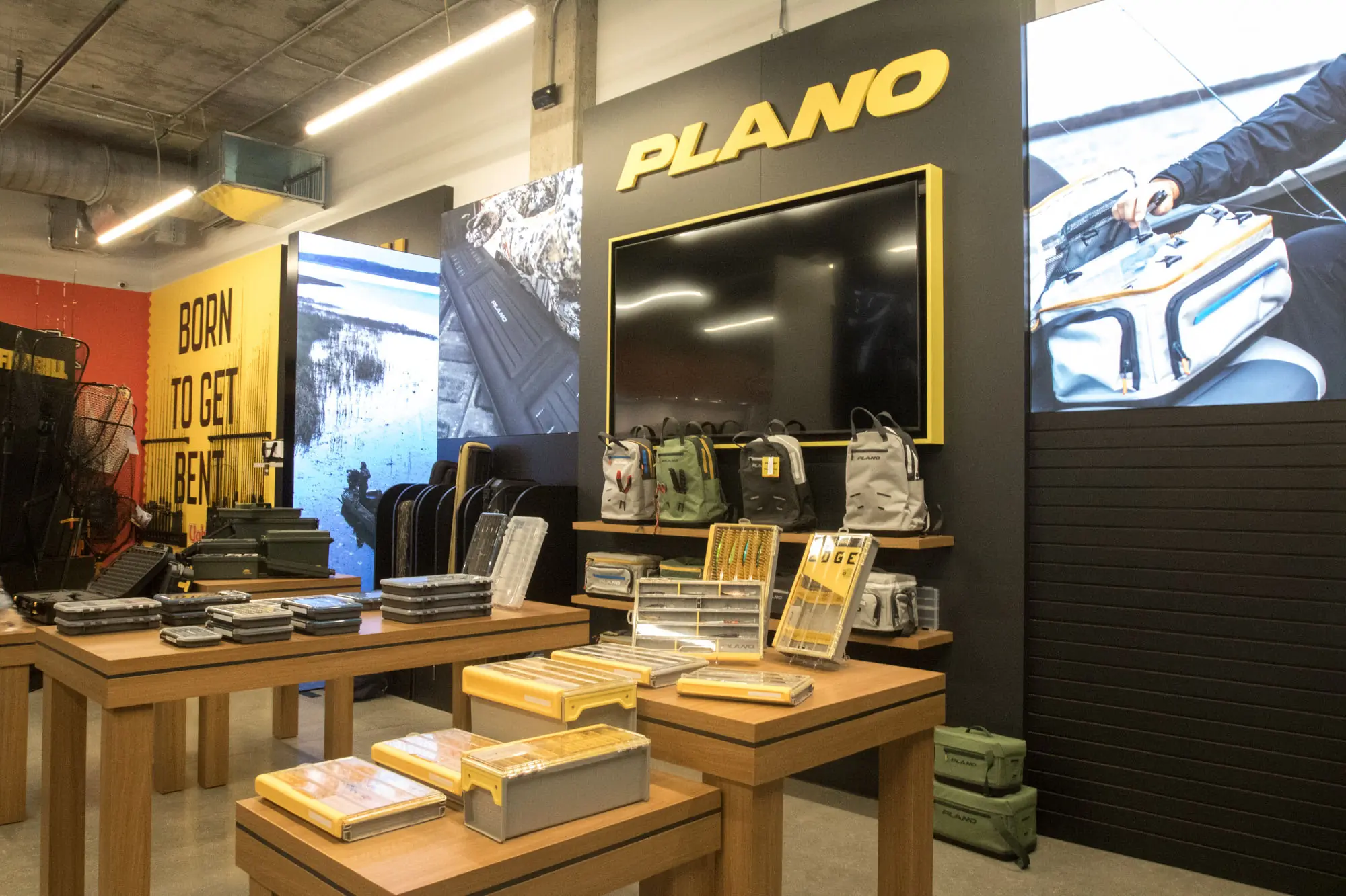 Plano booth displaying tackle boxes in a showroom