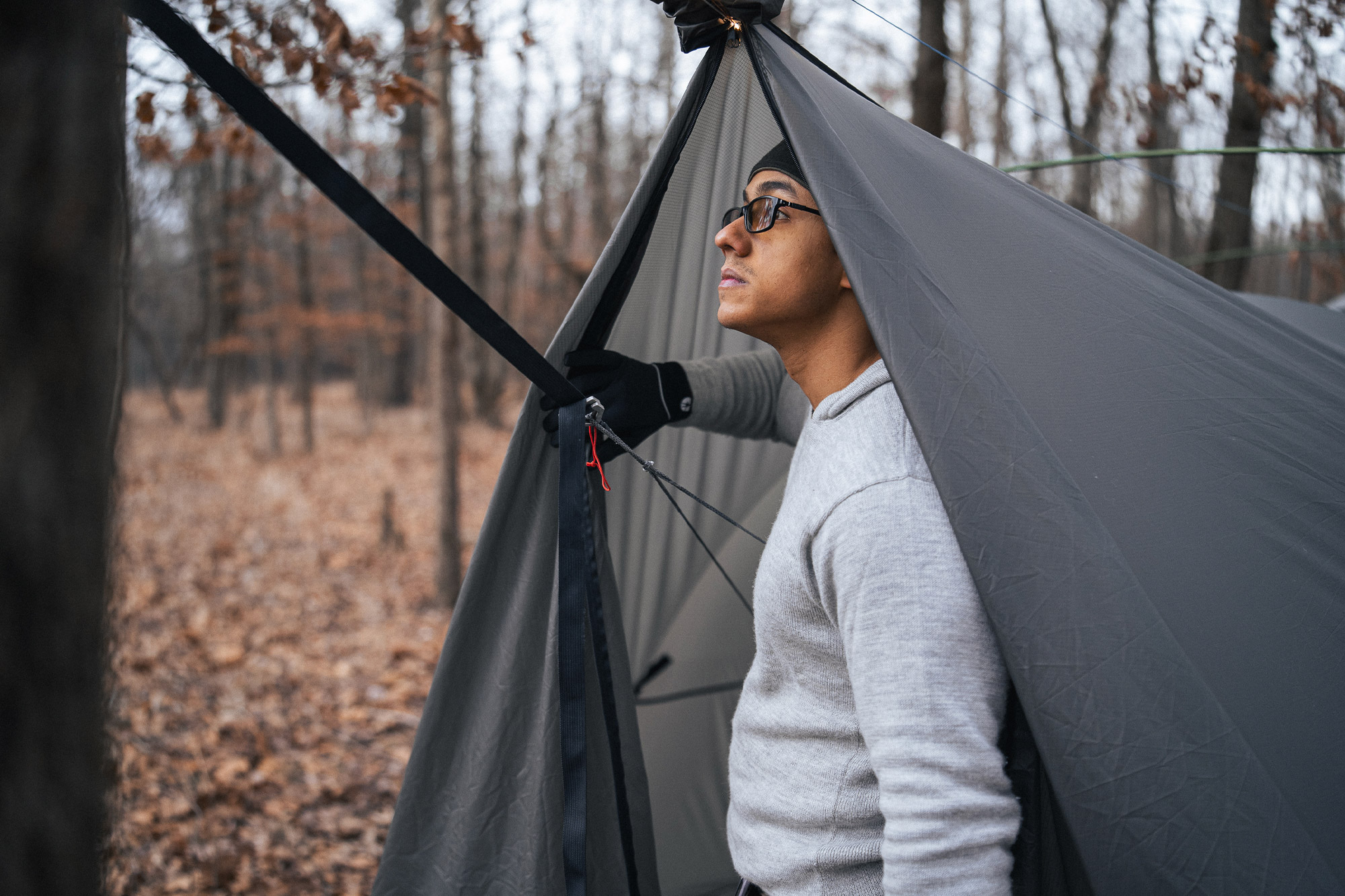 Camper standing under the Warbonnet Tsunami’s tall, structured entrance